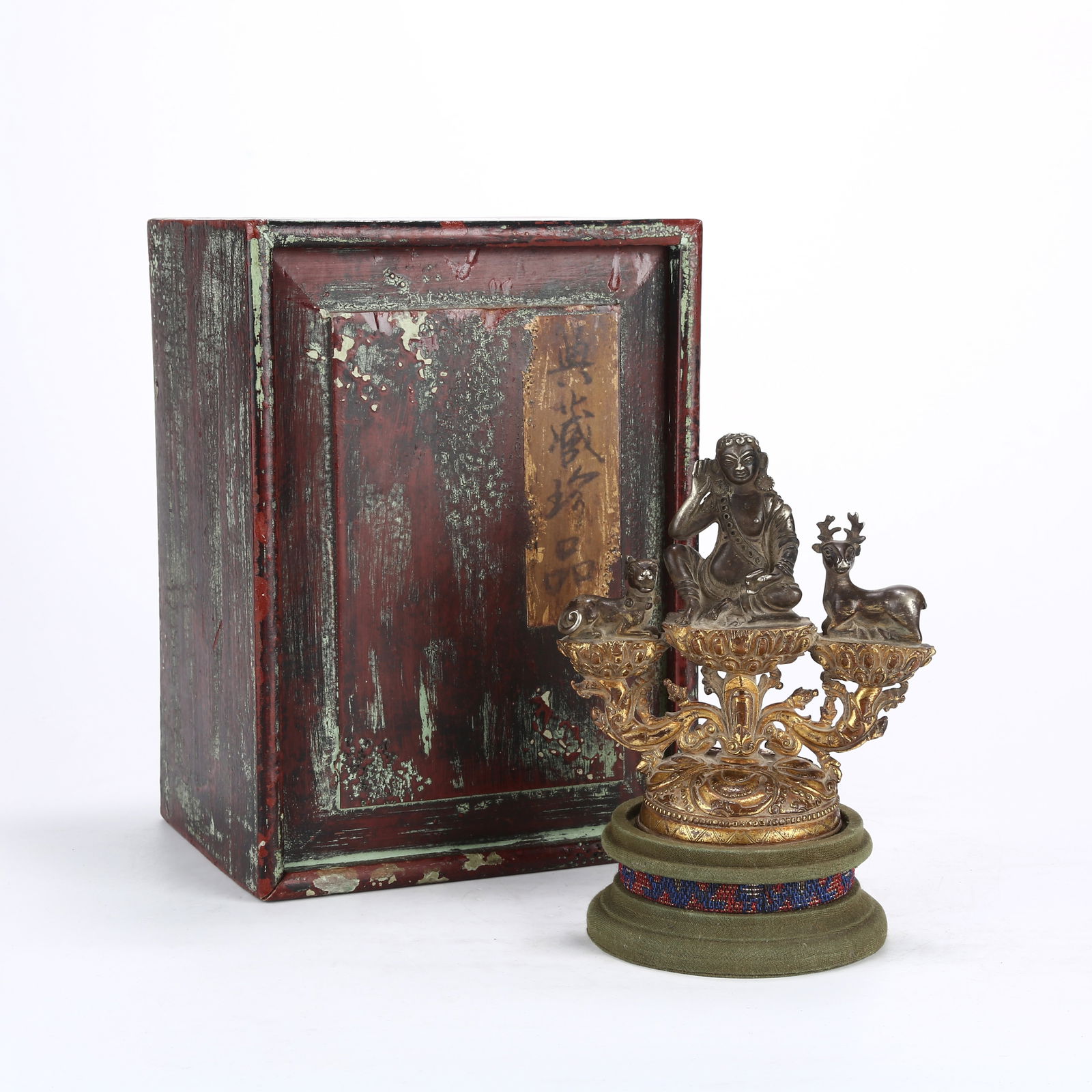 A TIBETAN SILVER STATUE OF MILAREPA (1 of 9)