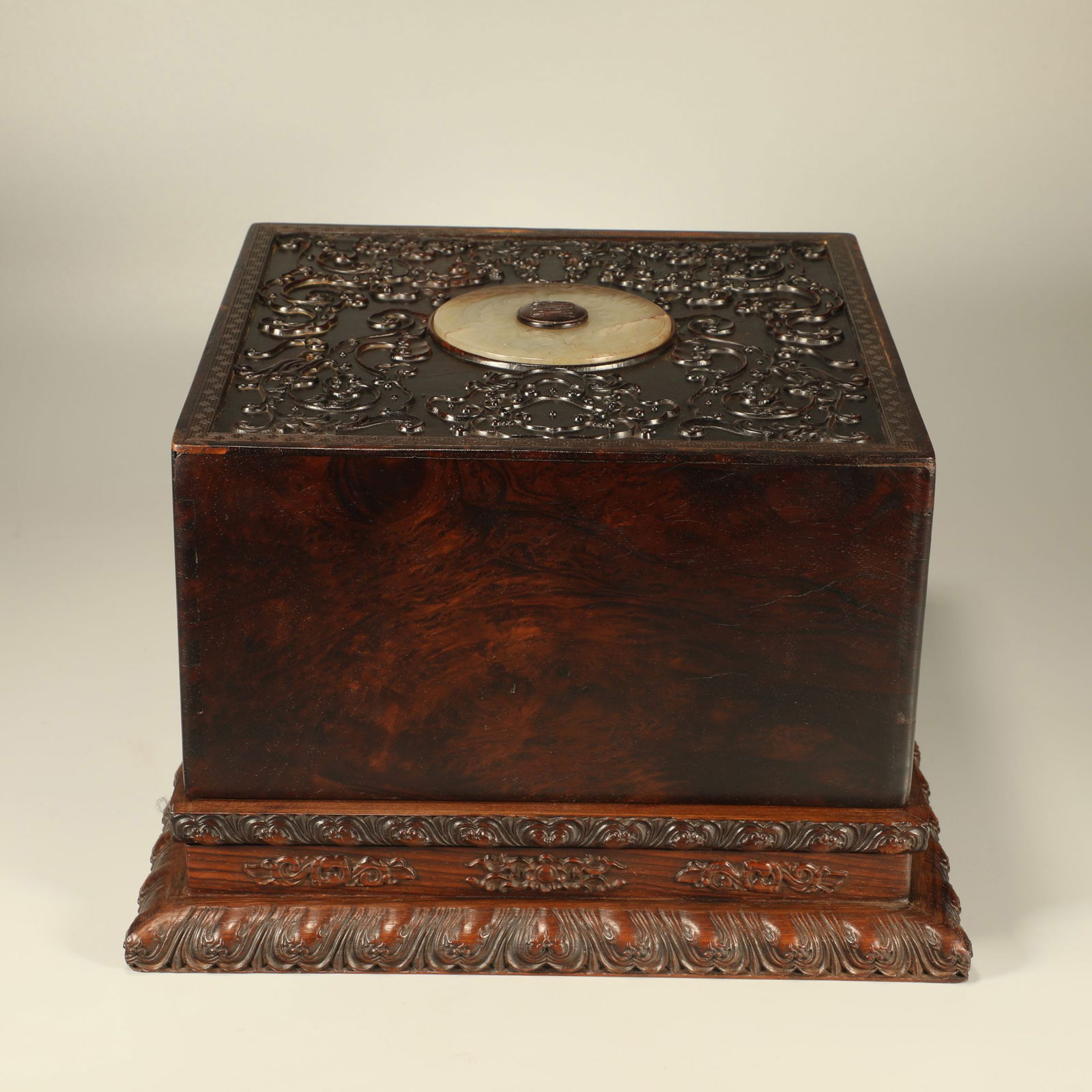 A HUANGHUALI WOOD COVERED BOX CARVED WITH DRAGON MOTIFS AND INLAID WITH A JADE BI DISC (1 of 6)