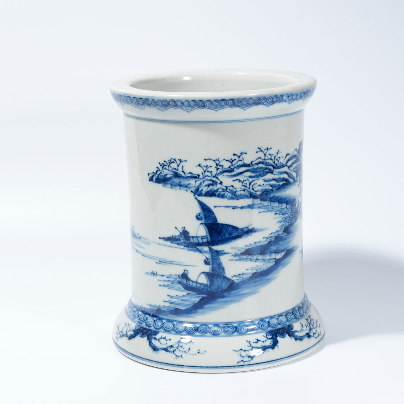 A BLUE-AND-WHITE BRUSH HOLDER WITH LANDSCAPE AND FIGURAL DECORATION (1 of 9)