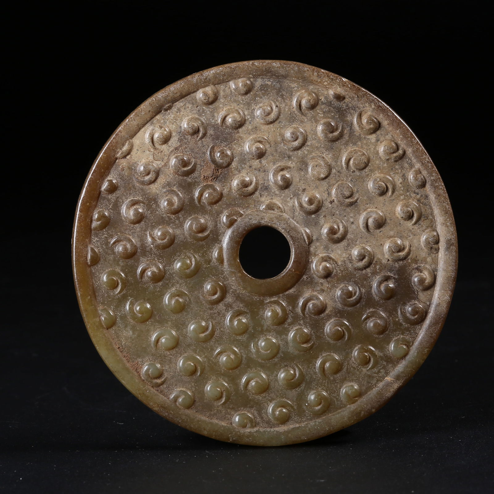 A ARCHAIC JADE BI DISC (1 of 9)