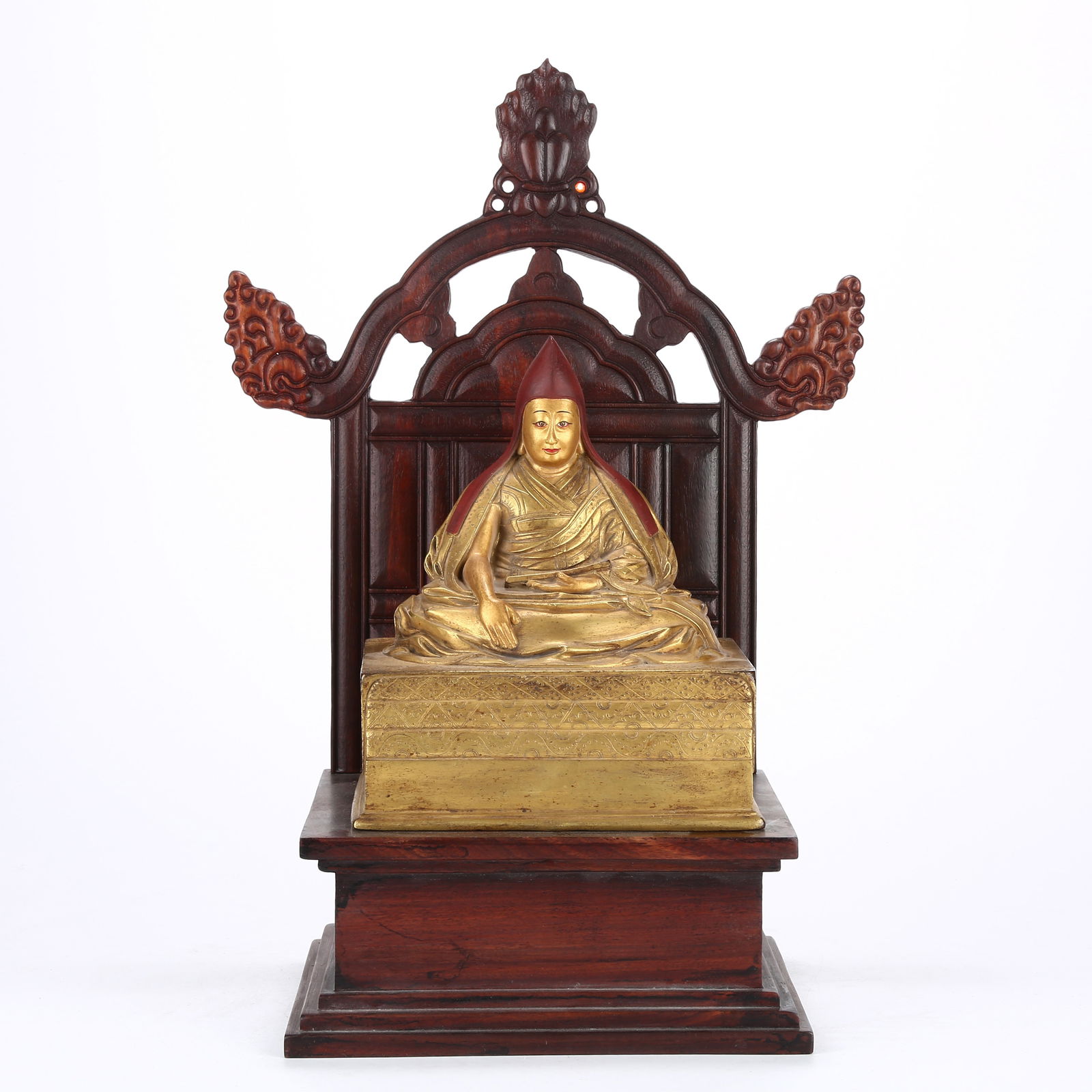 A GILT BRONZE STATUE OF A LAMA: Gilt Bronze Statue of a Lama