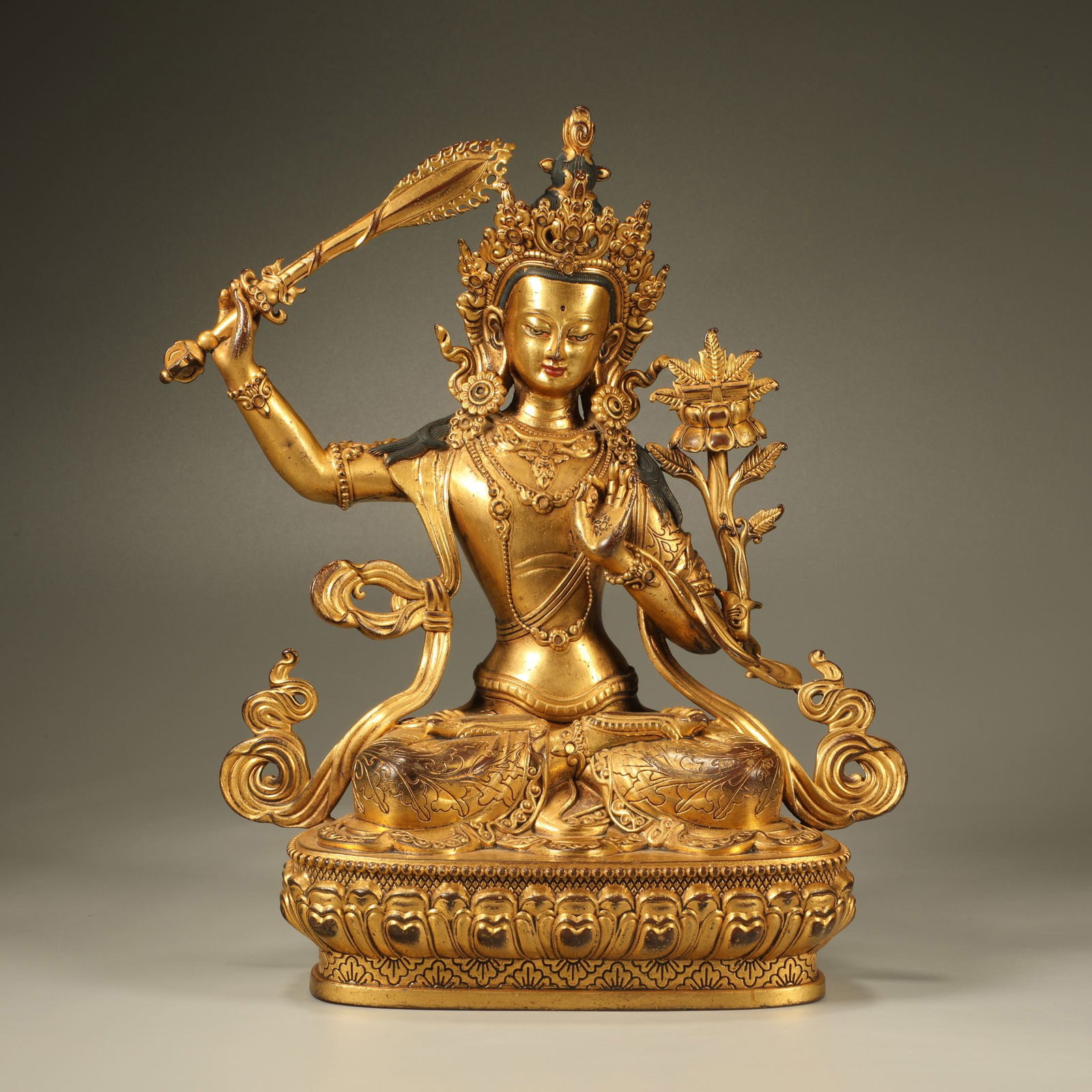 A GILT-BRONZE FIGURE OF MANJUSHRI (1 of 7)