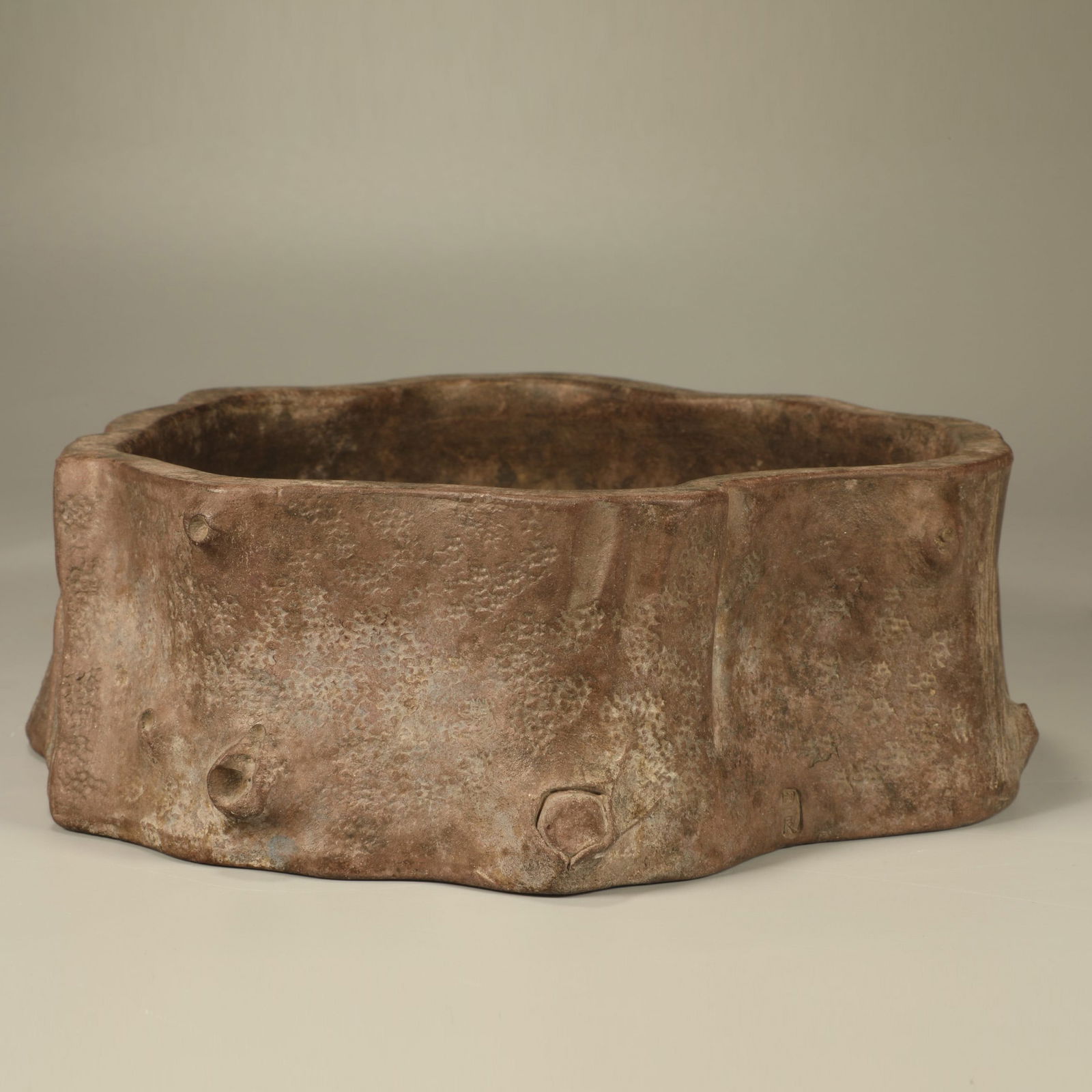 A YIXING STONEWARE BRUSH WASHER IN THE FORM OF A TREE STUMP (1 of 6)