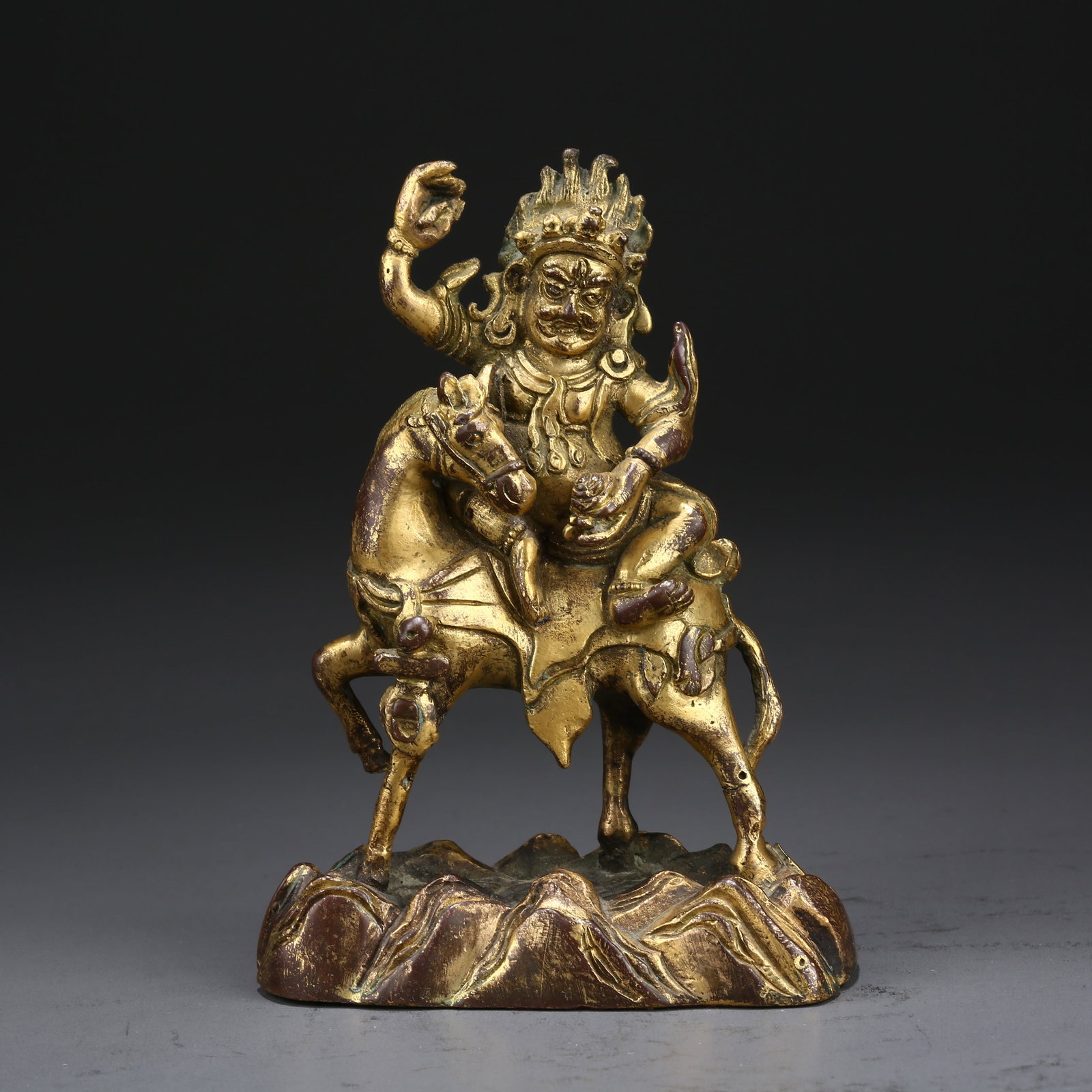 A GILT BRONZE PORTABLE STATUE OF PALDEN LHAMO (GLORIOUS GODDESS): Gilt Bronze Portable Statue of Palden Lhamo (Glorious Goddess)