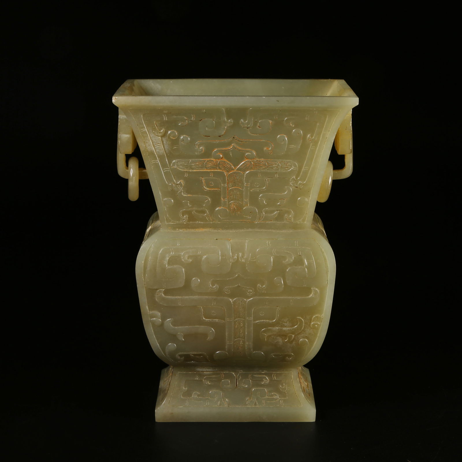 A ARCHAIC JADE RITUAL VESSEL WITH BEAST-MASK AND HINGED RING HANDLES: Archaic Jade Ritual Vessel with Beast-Mask and Hinged Ring Handles