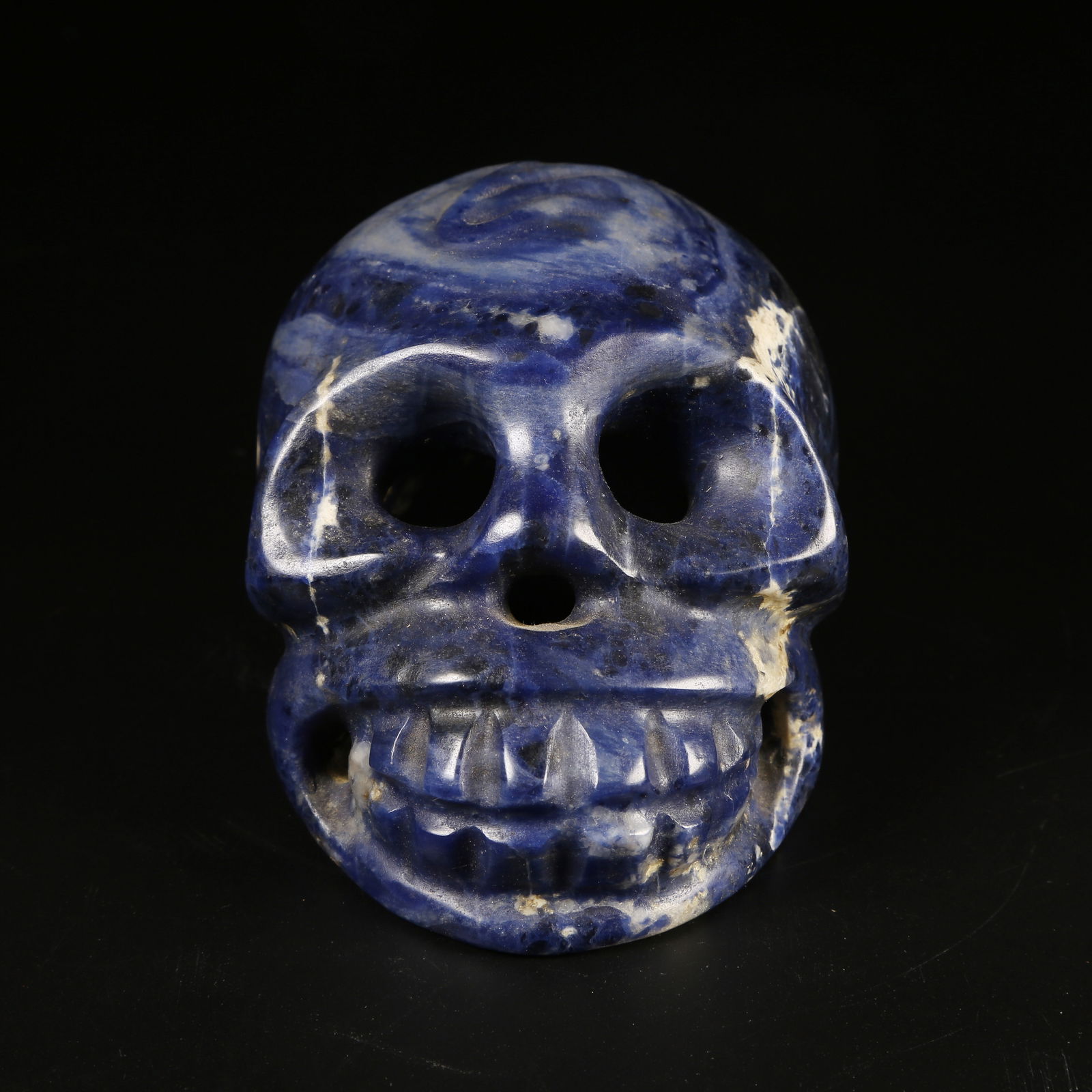 A LAPIS LAZULI CARVED SKULL ORNAMENT (1 of 8)