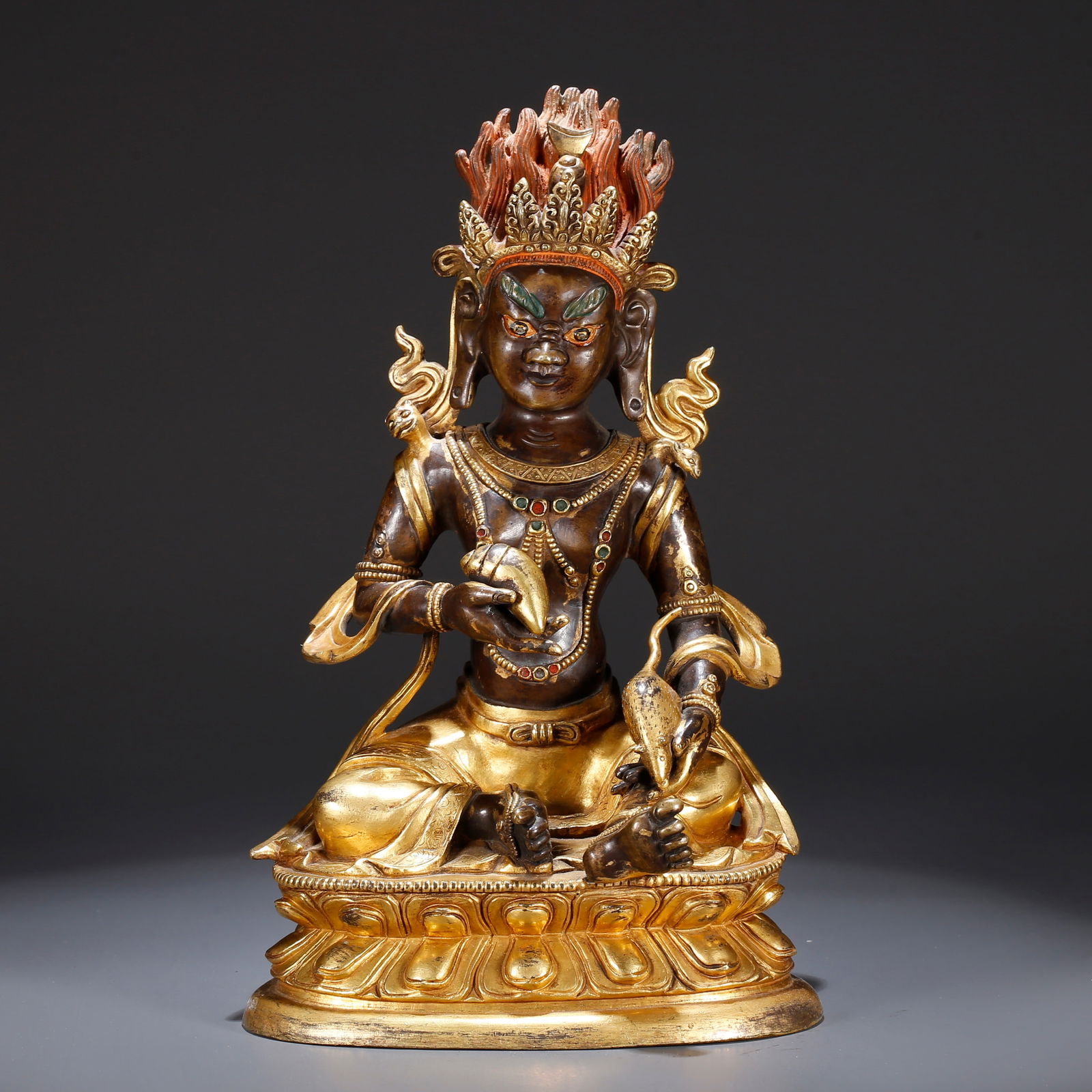 A GILT BRONZE FIGURE OF THE GOD OF WEALTH: Gilt Bronze Figure of the God of Wealth