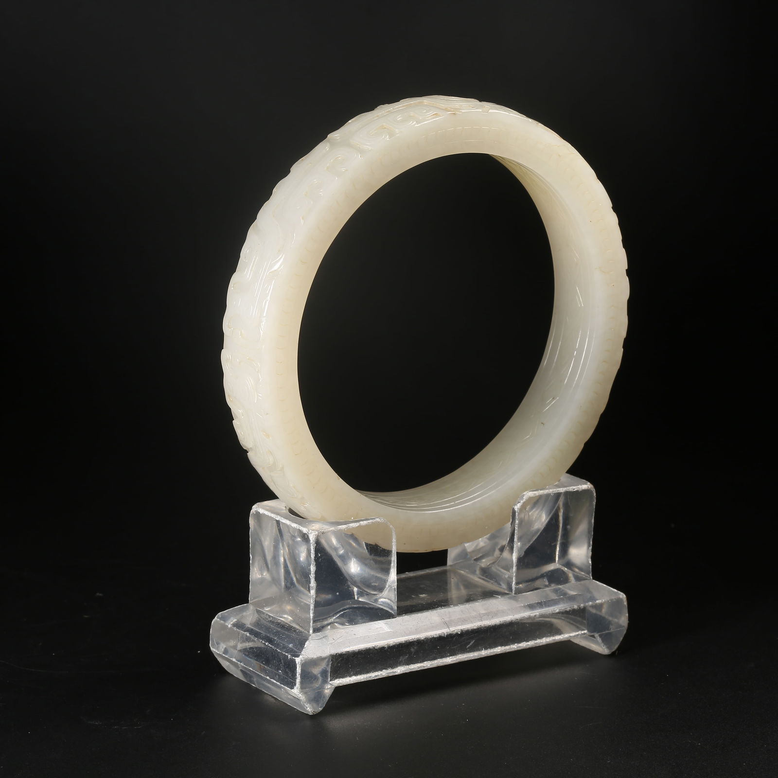 A HETIAN JADE PHOENIX MOTIF RING (1 of 10)