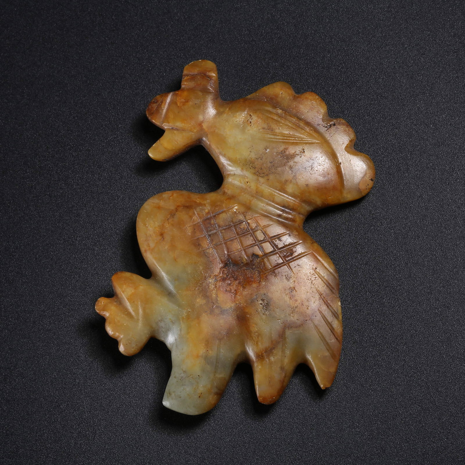 A ARCHAIC JADE DIVINE PHOENIX PENDANT (1 of 7)