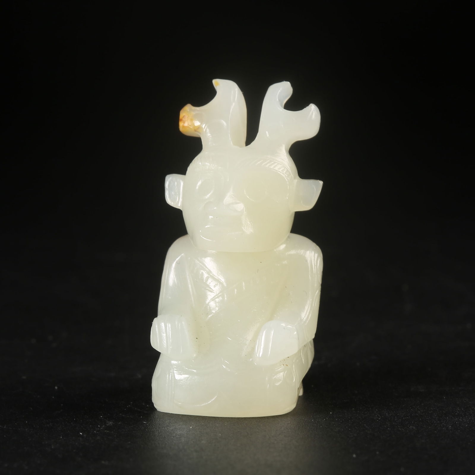 A HETIAN JADE KNEELING FIGURE ORNAMENT (1 of 8)