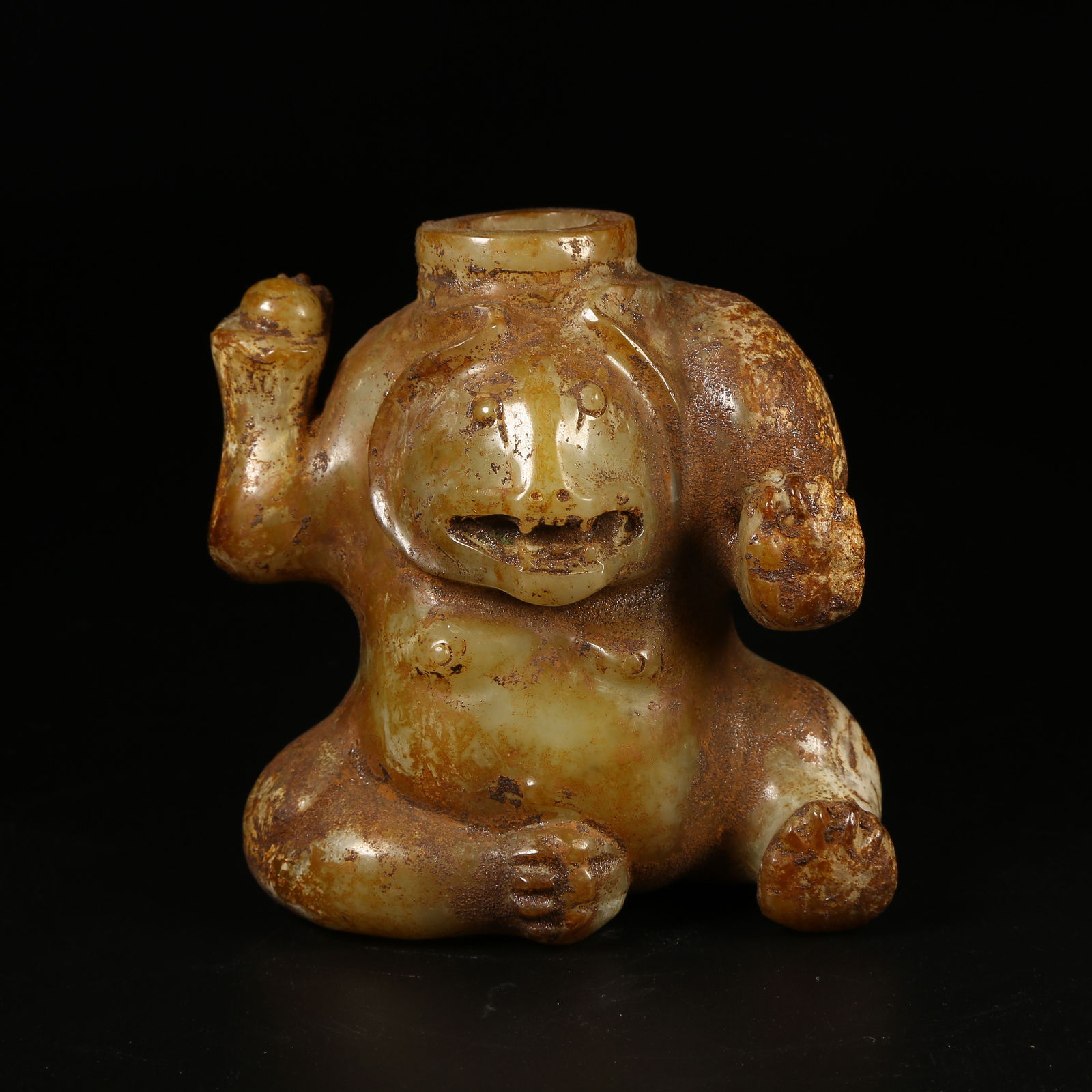 A ARCHAIC JADE BEAST-SHAPED RITUAL VESSEL (1 of 9)