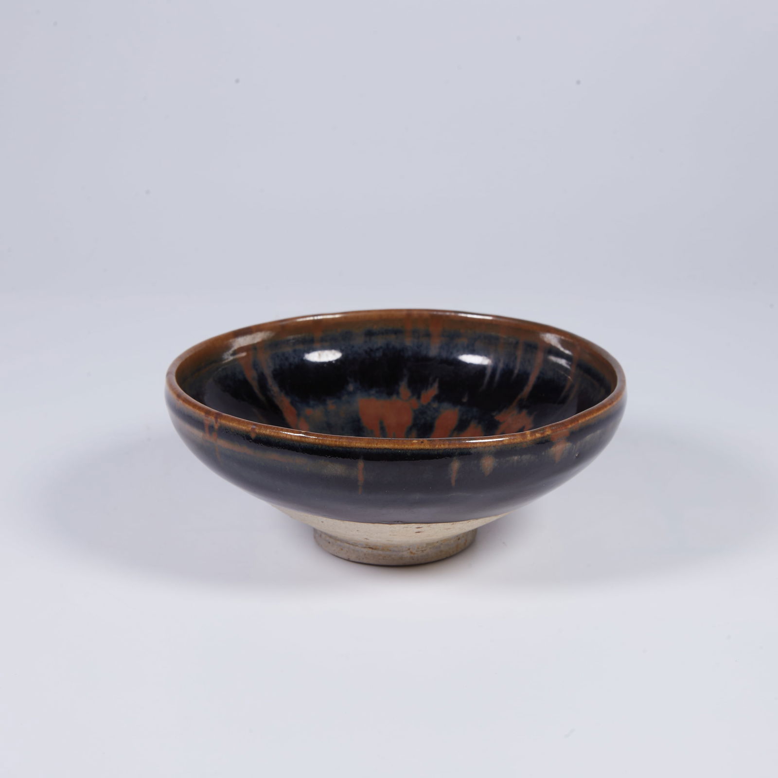 A IRON-RUST–GLAZED CUP (1 of 5)