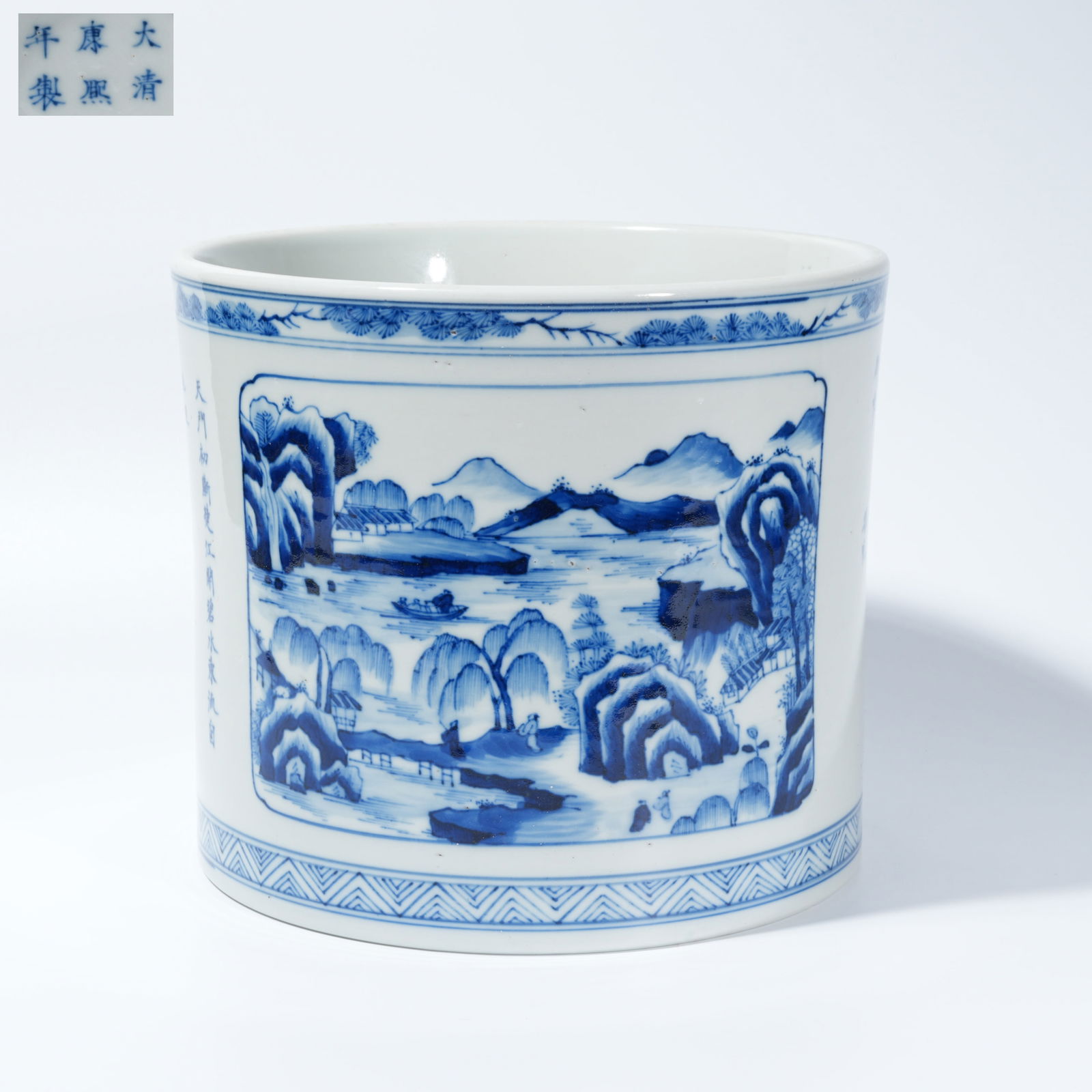 A BLUE-AND-WHITE BRUSH HOLDER WITH LANDSCAPE AND FIGURAL DECORATION (1 of 9)