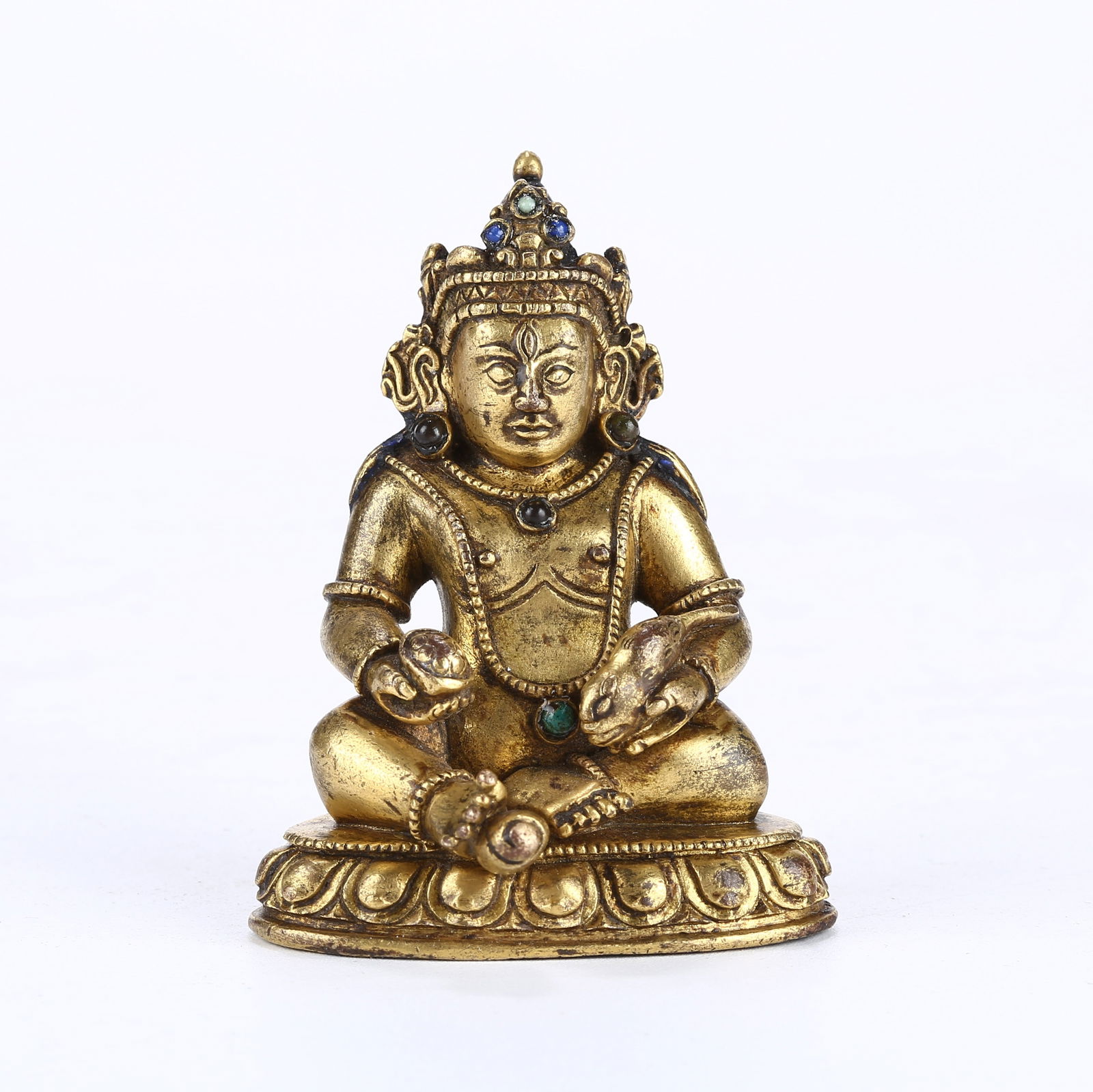 A GILT BRONZE TRAVEL-SIZED YELLOW JAMBHALA (WEALTH DEITY) (1 of 8)