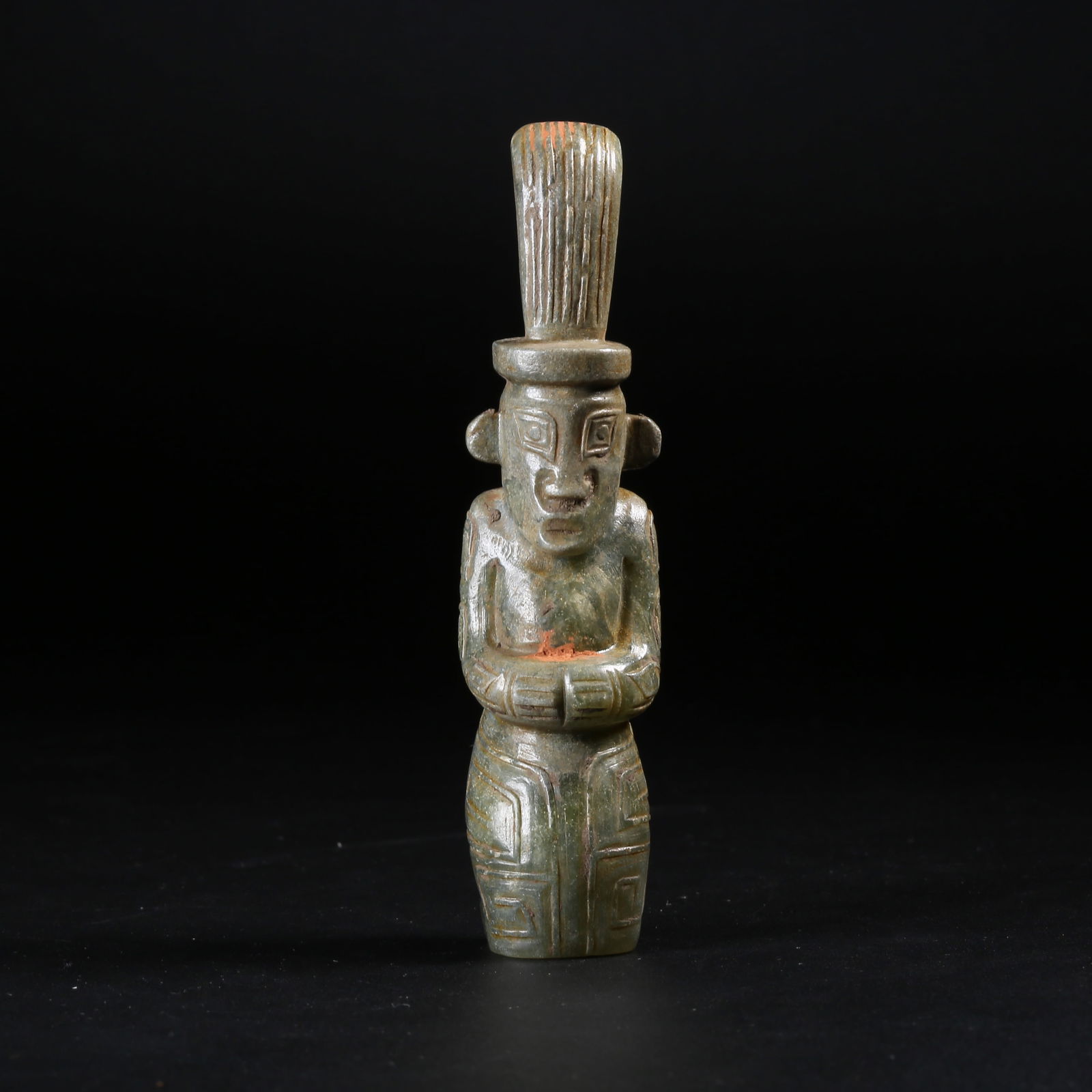 A ARCHAIC JADE DEITY PENDANT (1 of 9)