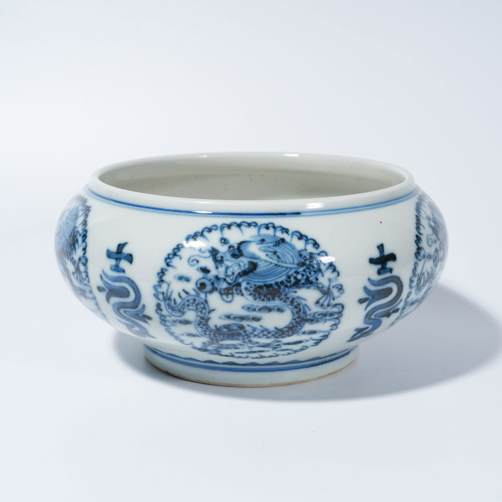 A BLUE-AND-WHITE JAR WITH FIVE DRAGONS BLESSING LONGEVITY MOTIF (1 of 9)