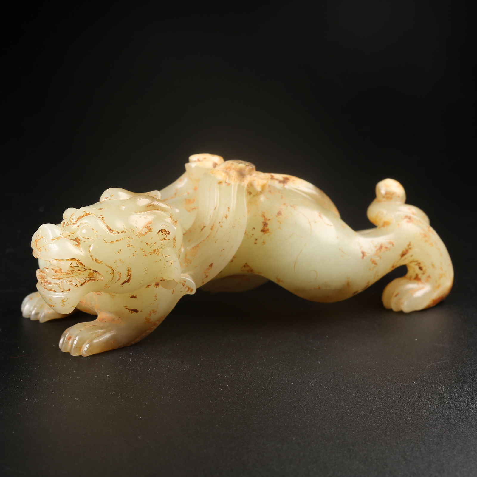 A ARCHAIC JADE AUSPICIOUS BEAST ORNAMENT (1 of 8)