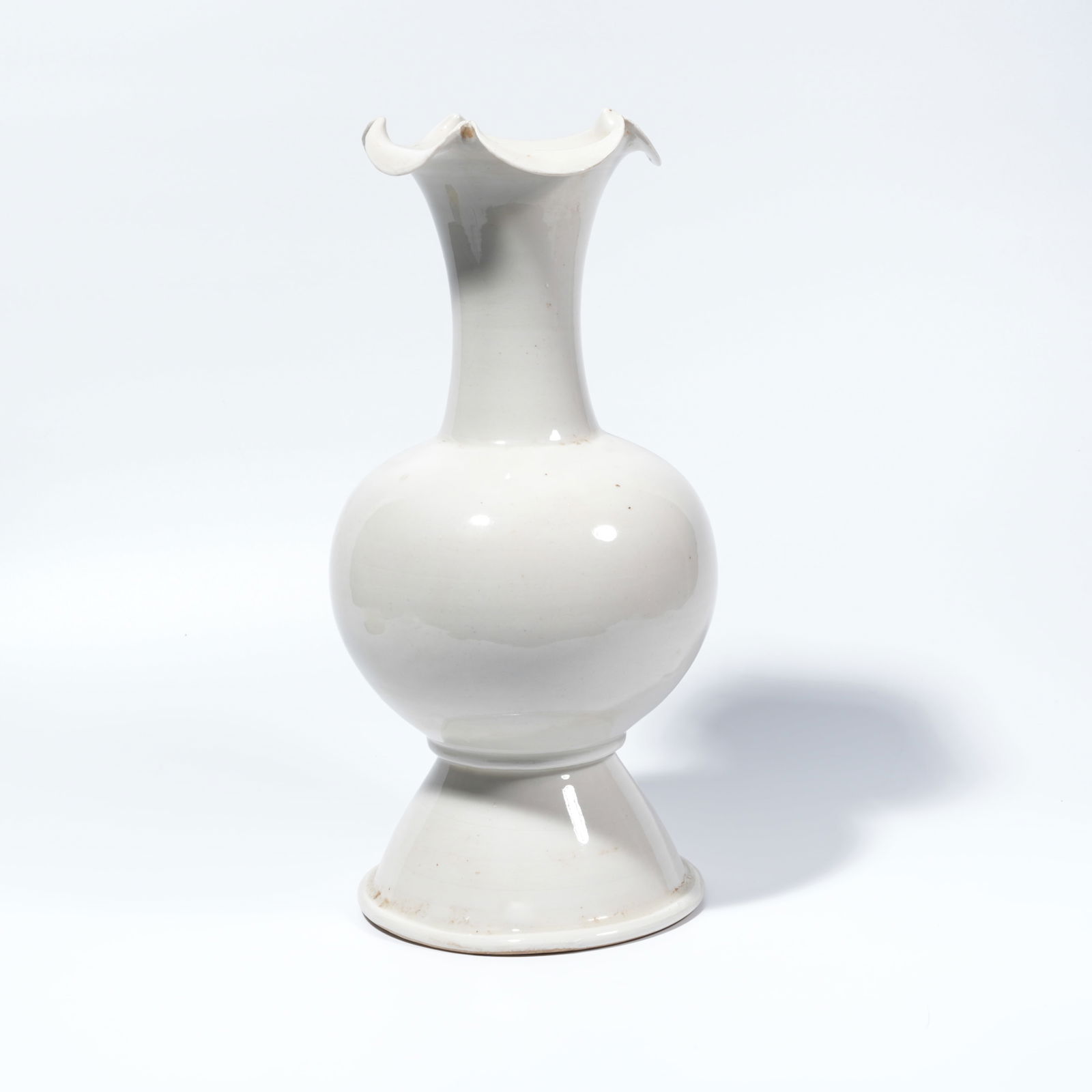 A DING WARE VASE WITH FLARED MOUTH: Ding ware vase with flared mouth