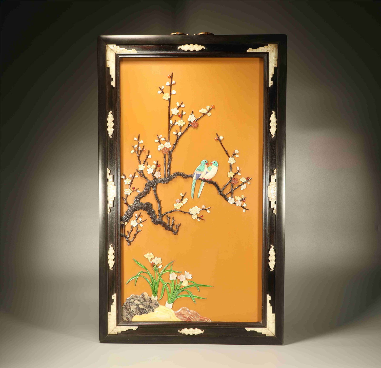 A ZITAN WOOD HANGING SCREEN INLAID WITH HARDSTONES, FEATURING FLORAL AND BIRD MOTIFS: Zitan wood hanging screen inlaid with hardstones, featuring floral and bird motifs