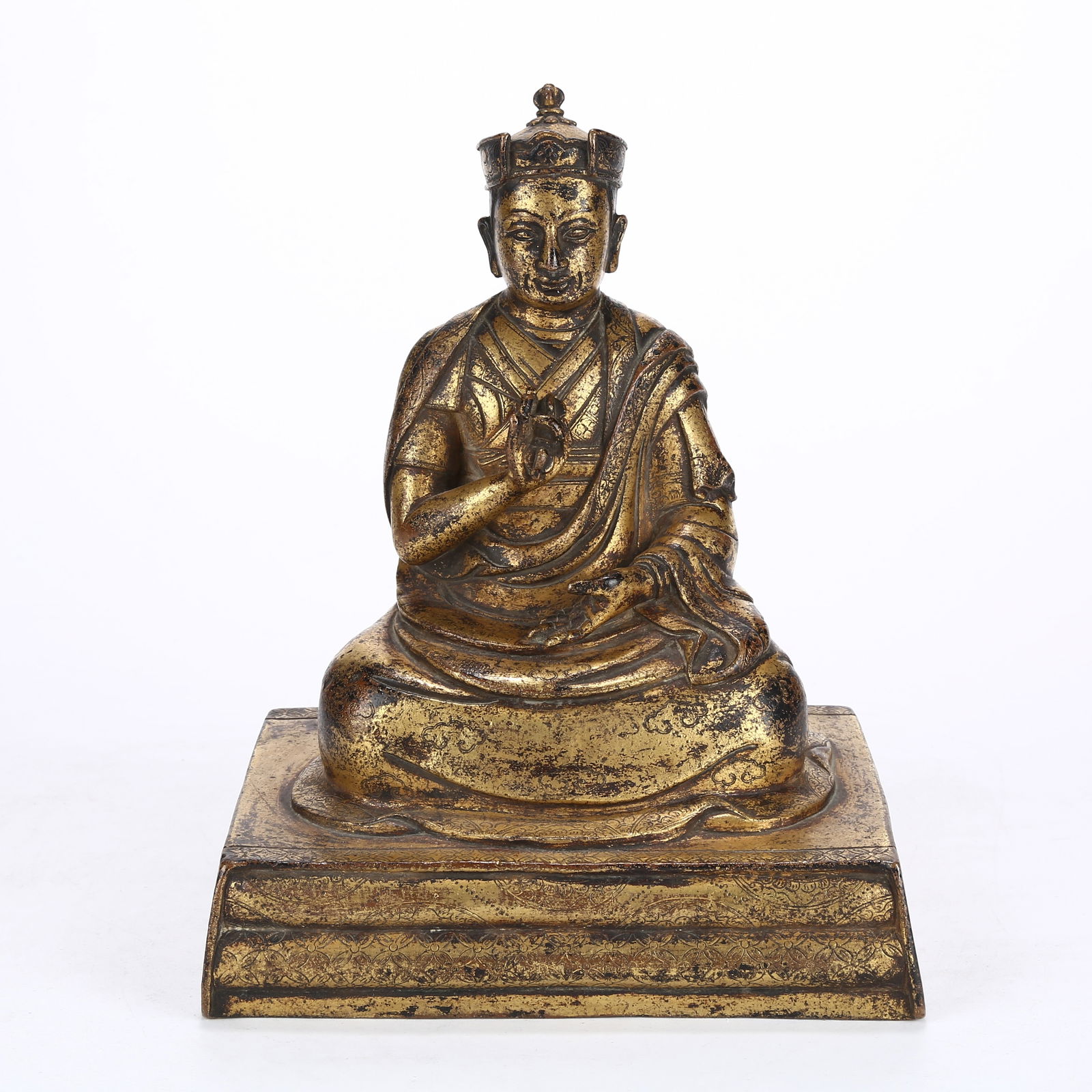 A GILT BRONZE STATUE OF A LAMA: Gilt Bronze Statue of a Lama