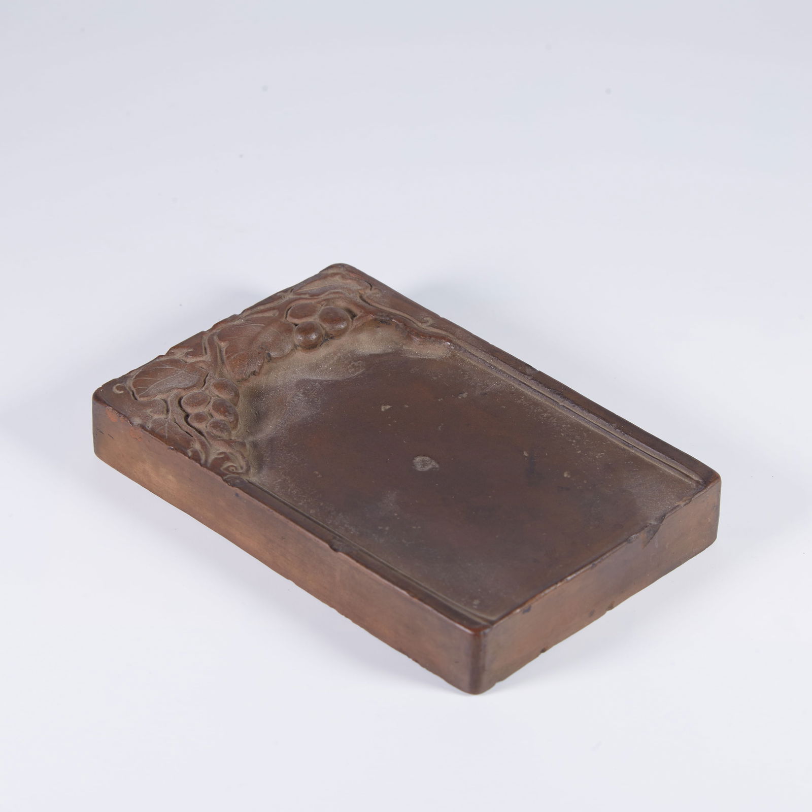 A CHENGNI INKSTONE WITH GRAPE MOTIF (1 of 10)