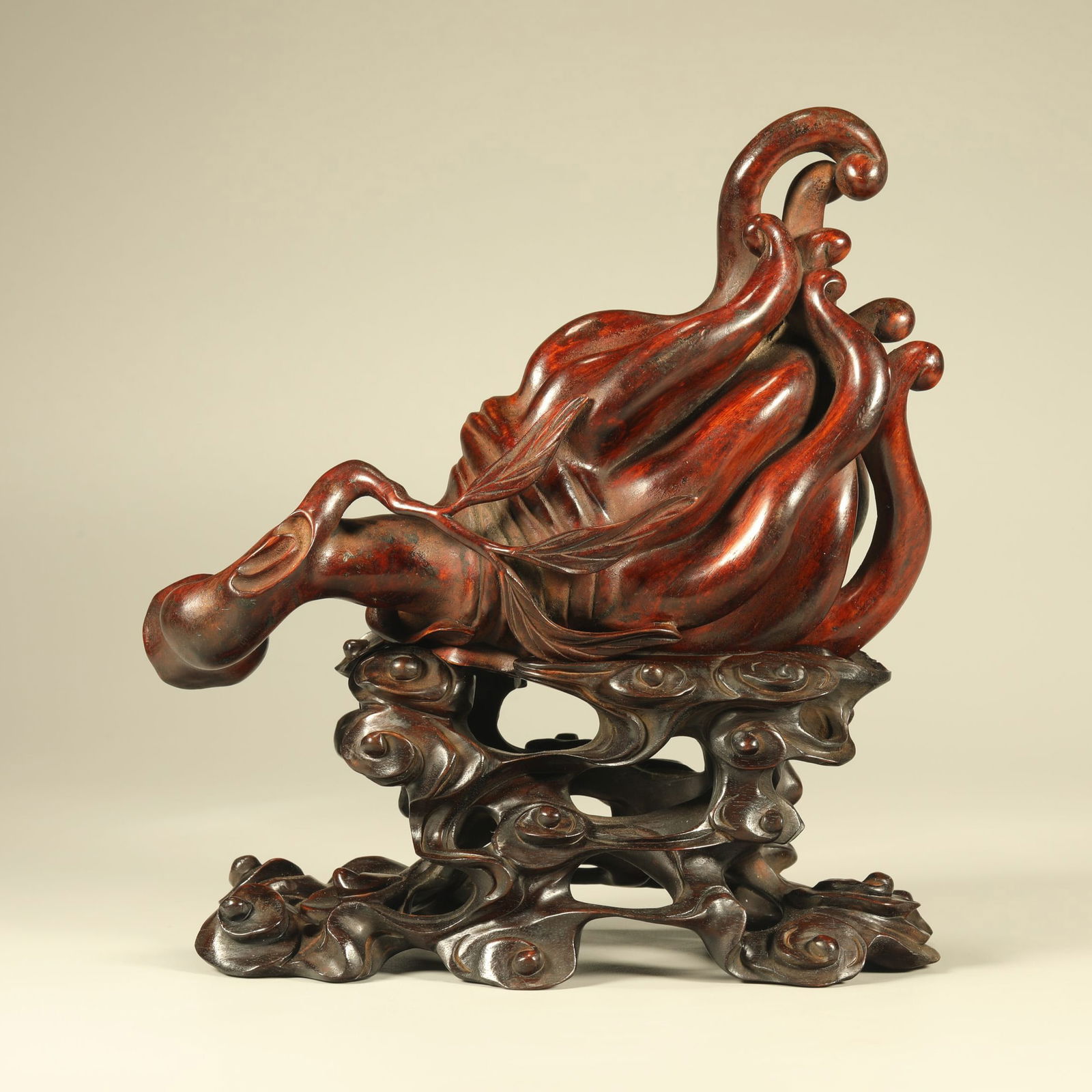 A HUANGHUALI CARVED BUDDHA'S HAND ORNAMENT: Huanghuali Carved Buddha's Hand Ornament