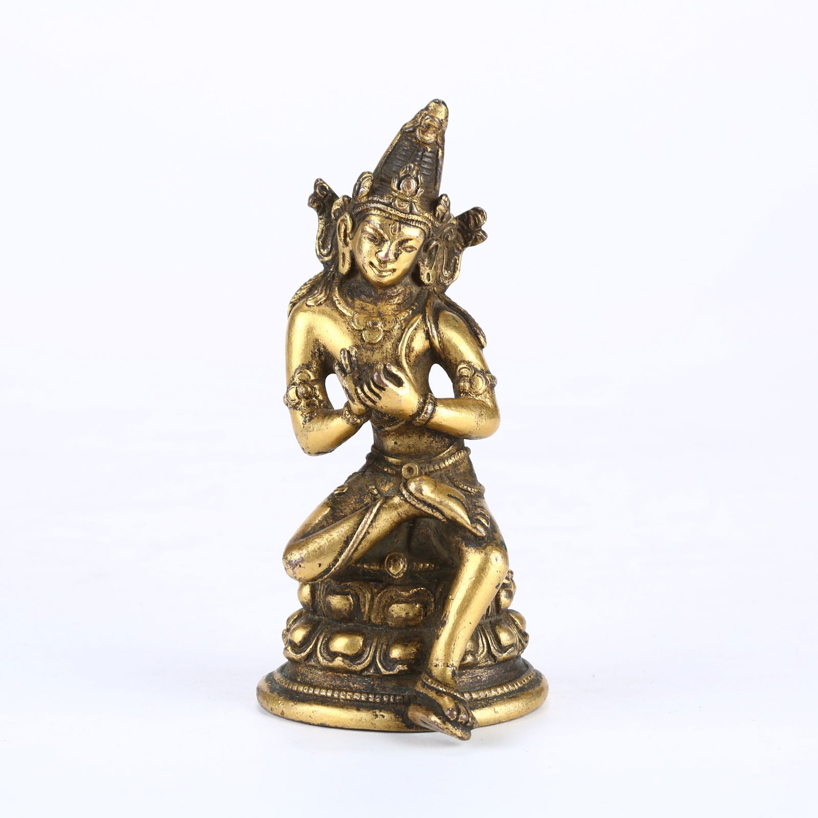 A GILT BRONZE SEATED BODHISATTVA IN PALA STYLE (1 of 10)
