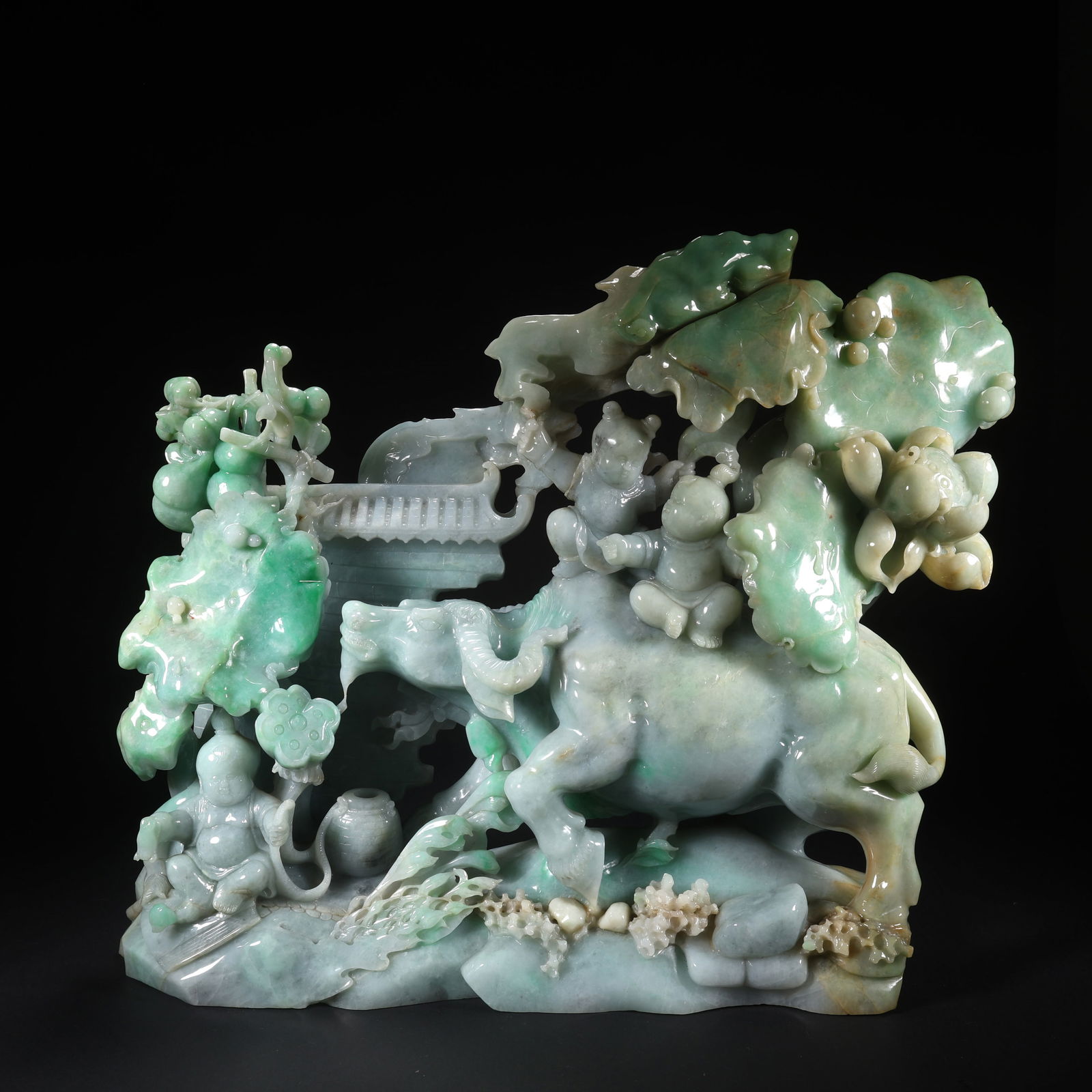 A JADEITE THREE BOYS PLAYING WITH AN OX FIGURE (1 of 9)