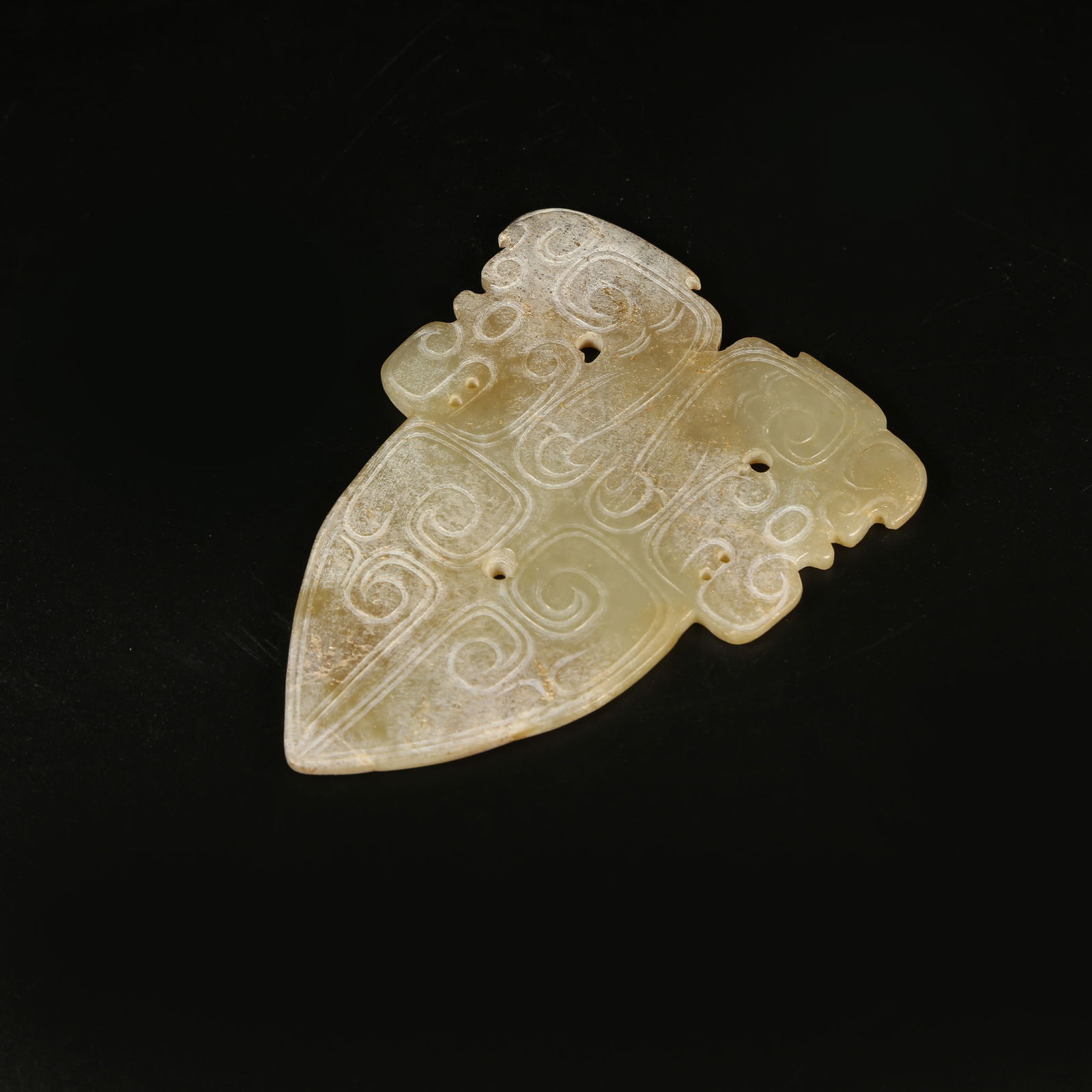 A ARCHAIC JADE PENDANT WITH AUSPICIOUS BEAST DESIGN: Archaic Jade Pendant with Auspicious Beast Design