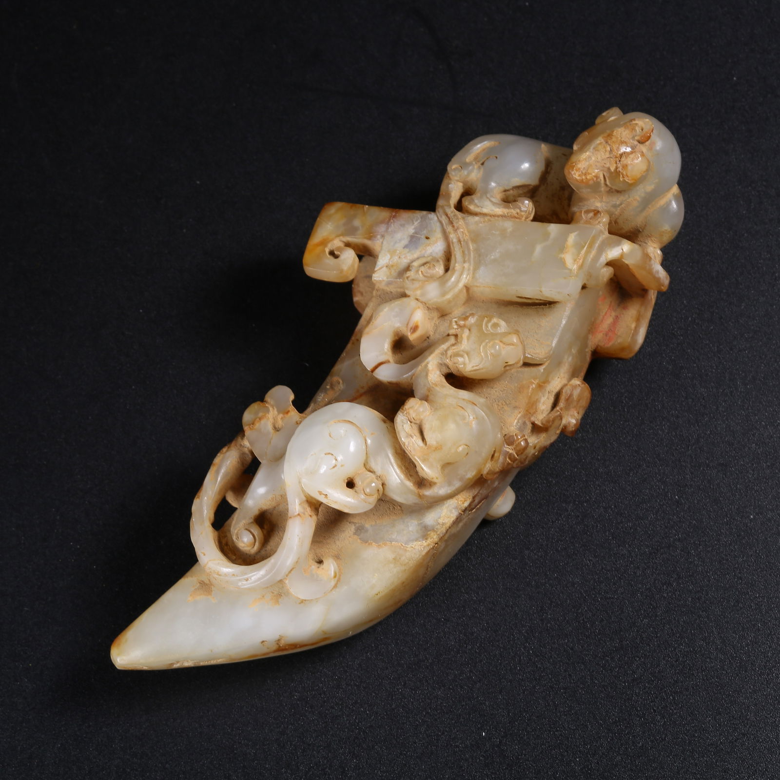 A ARCHAIC JADE PENDANT WITH AUSPICIOUS BEAST MOTIF (1 of 8)
