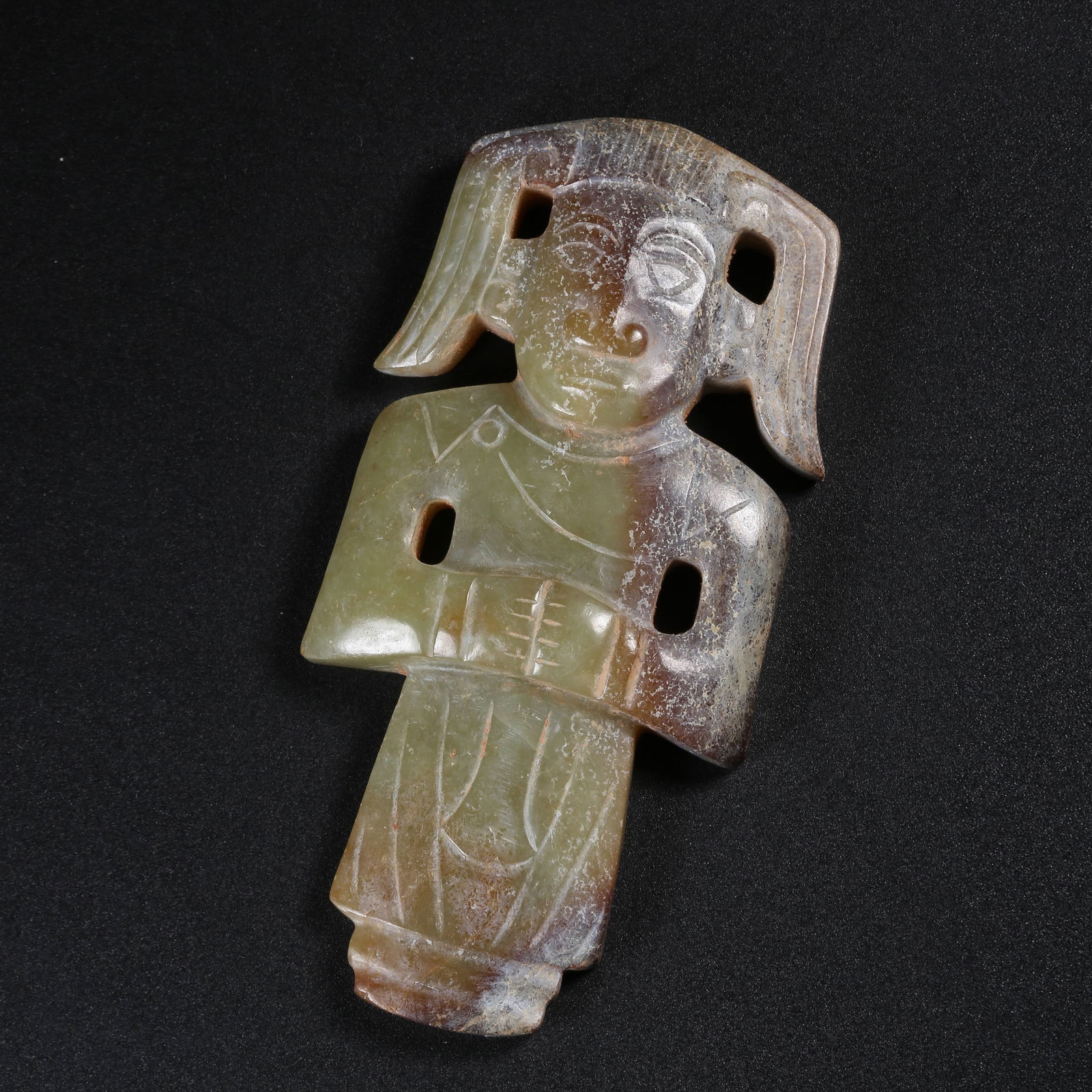 A ARCHAIC JADE DEITY FIGURE (1 of 9)
