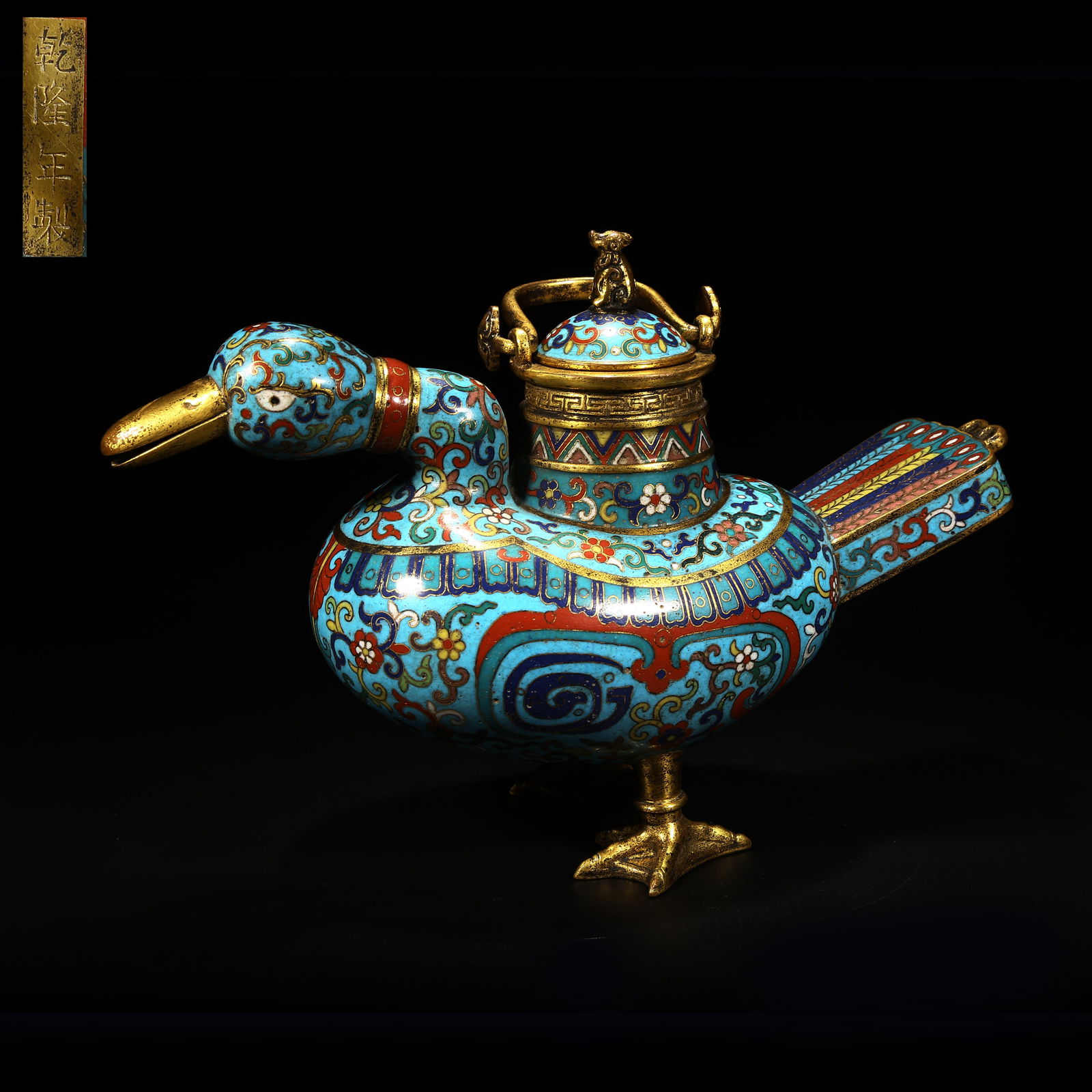 A BRONZE CLOISONNÉ ENAMEL PRECIOUS DUCK TEAPOT WITH HANDLE: Bronze Cloisonné Enamel Precious Duck Teapot with Handle