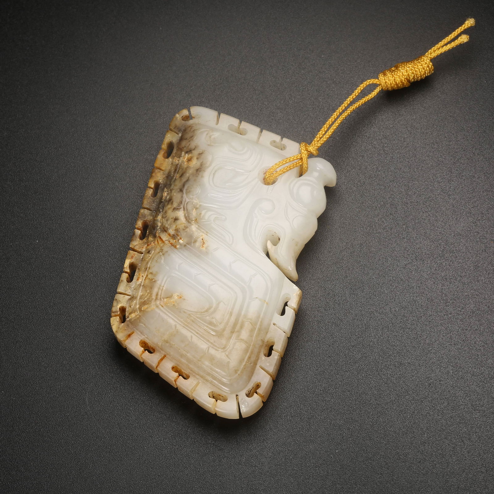 A ARCHAIC JADE S-SHAPED DRAGON PENDANT (1 of 8)