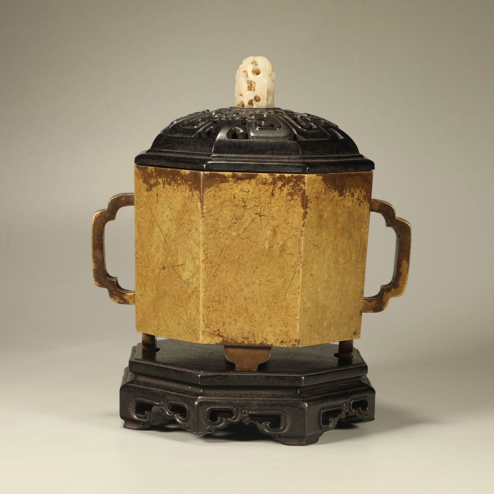 A BRONZE OCTAGONAL INCENSE BURNER WITH TWIN HANDLES (1 of 6)
