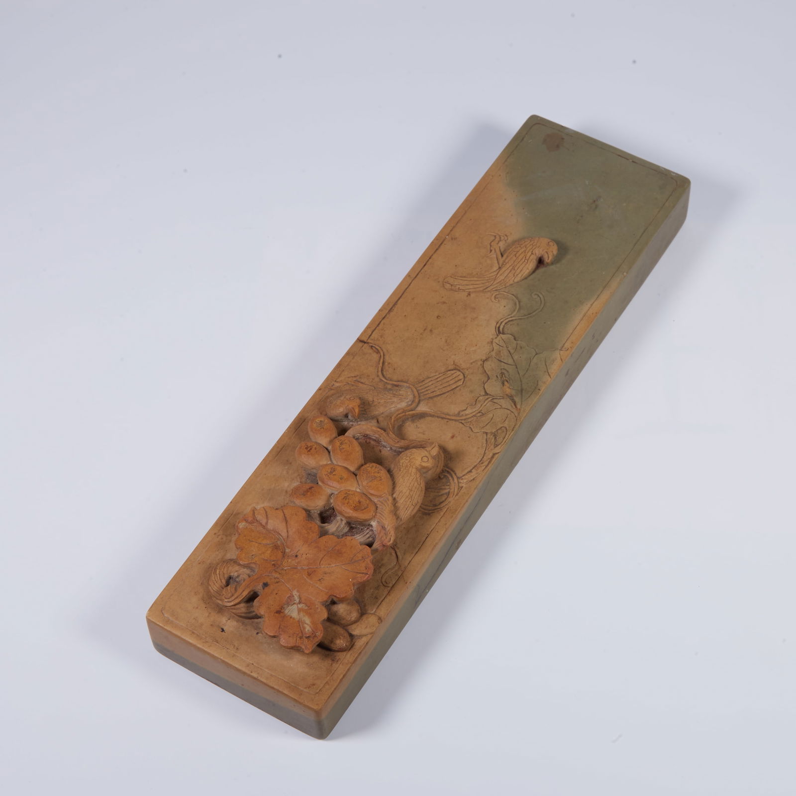 A QIYANG STONE PAPERWEIGHT WITH BIRD MOTIF (1 of 8)