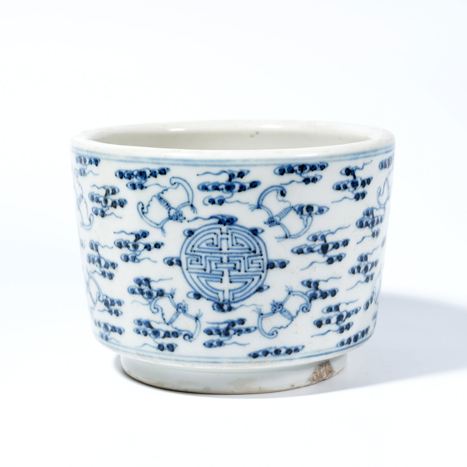 A BLUE-AND-WHITE INCENSE BURNER WITH "FORTUNE AND LONGEVITY" MOTIFS: Blue-and-white incense burner with "fortune and longevity" motifs