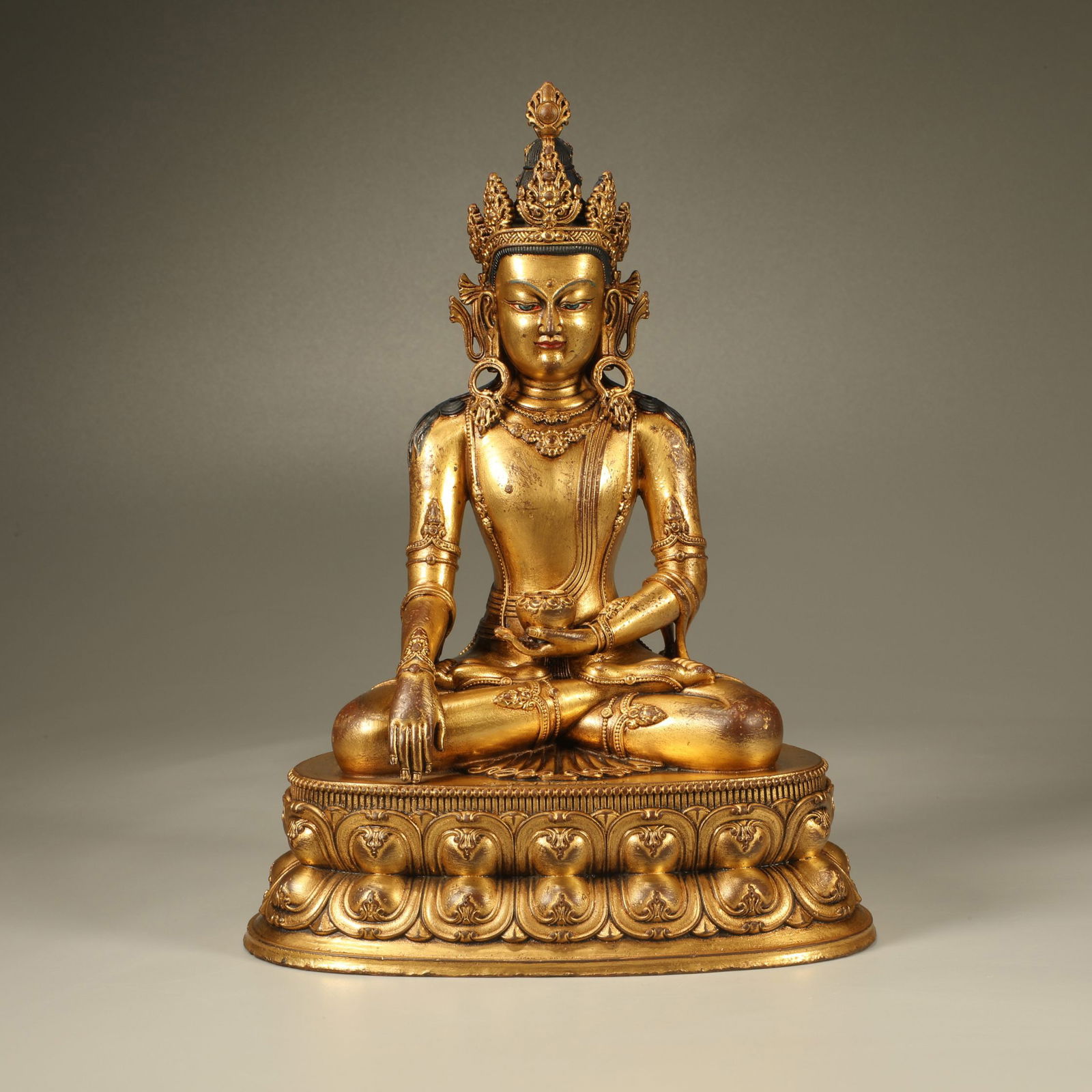 A GILT-BRONZE FIGURE OF AMITAYUS: Gilt-bronze figure of Amitayus