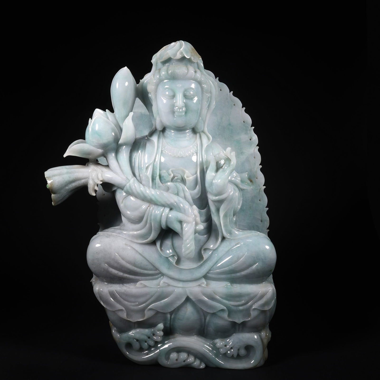 A JADEITE SEATED GUANYIN HOLDING A LOTUS FIGURE (1 of 9)