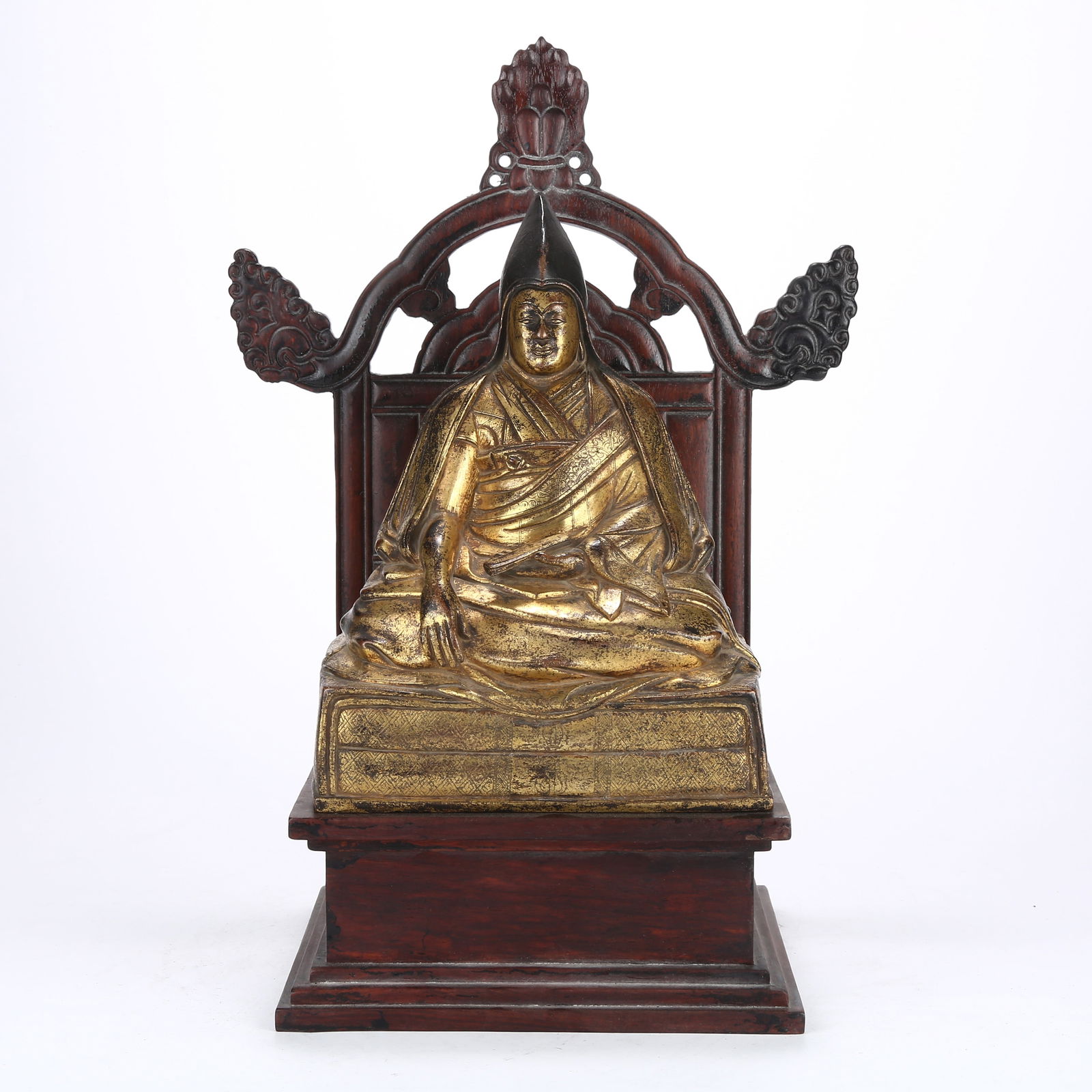 A GILT BRONZE STATUE OF A LAMA: Gilt Bronze Statue of a Lama
