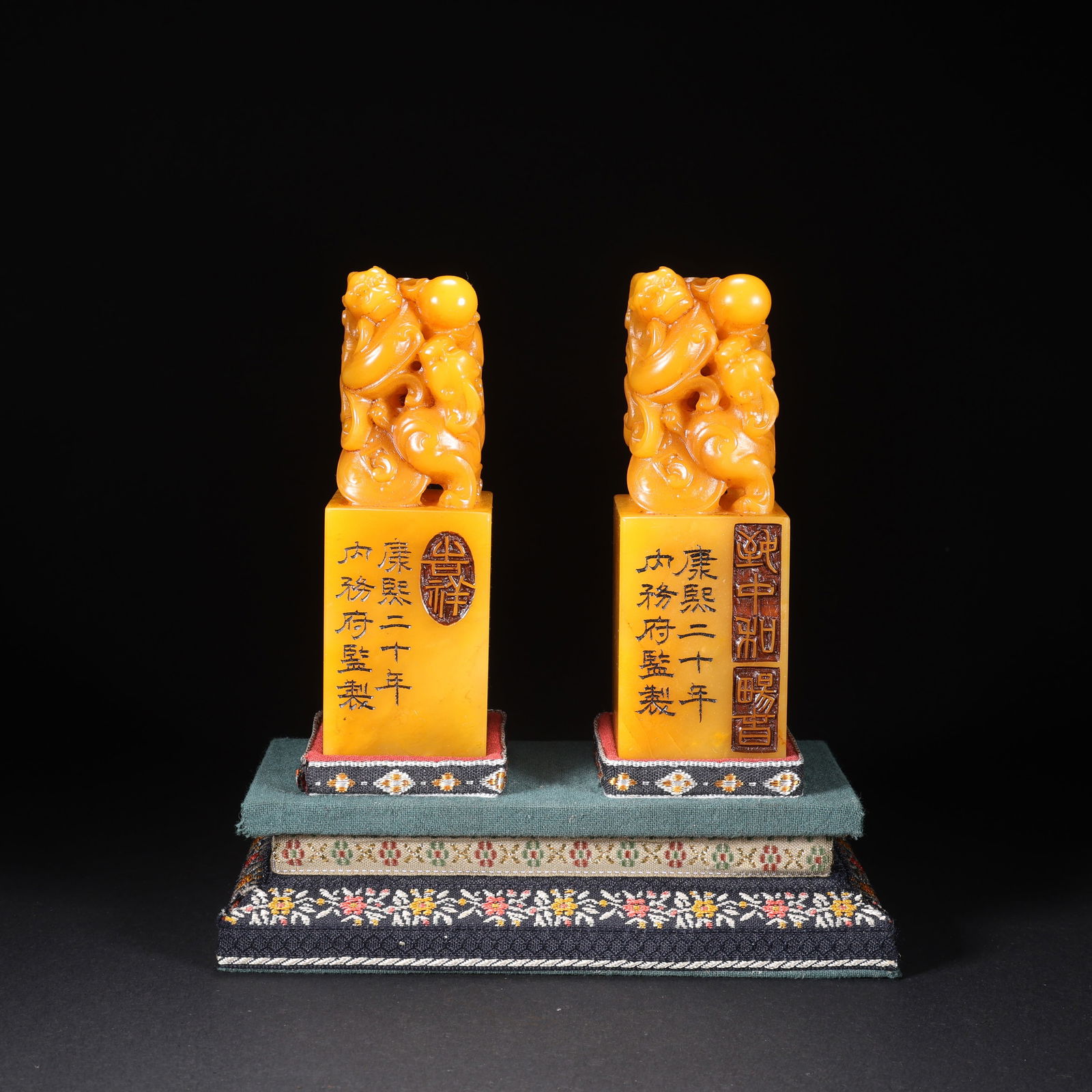 A PAIR OF SHOUSHAN TIANHUANG STONE SEALS WITH TWO DRAGONS PLAYING WITH A PEARL: Pair of Shoushan Tianhuang Stone Seals with Two Dragons Playing with a Pearl