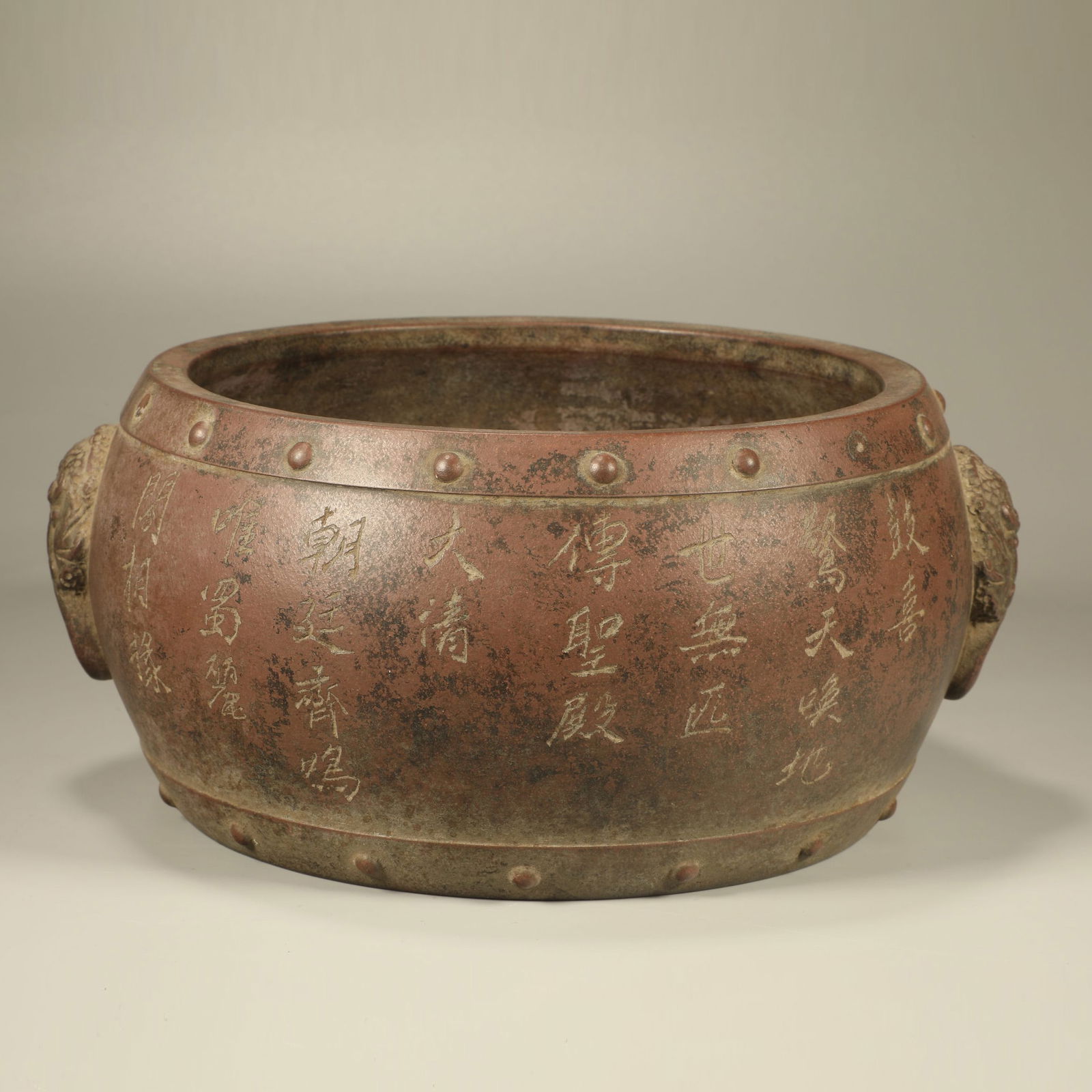 A YIXING STONEWARE BRUSH WASHER WITH POETIC INSCRIPTIONS AND LION-HEAD HANDLES (1 of 6)