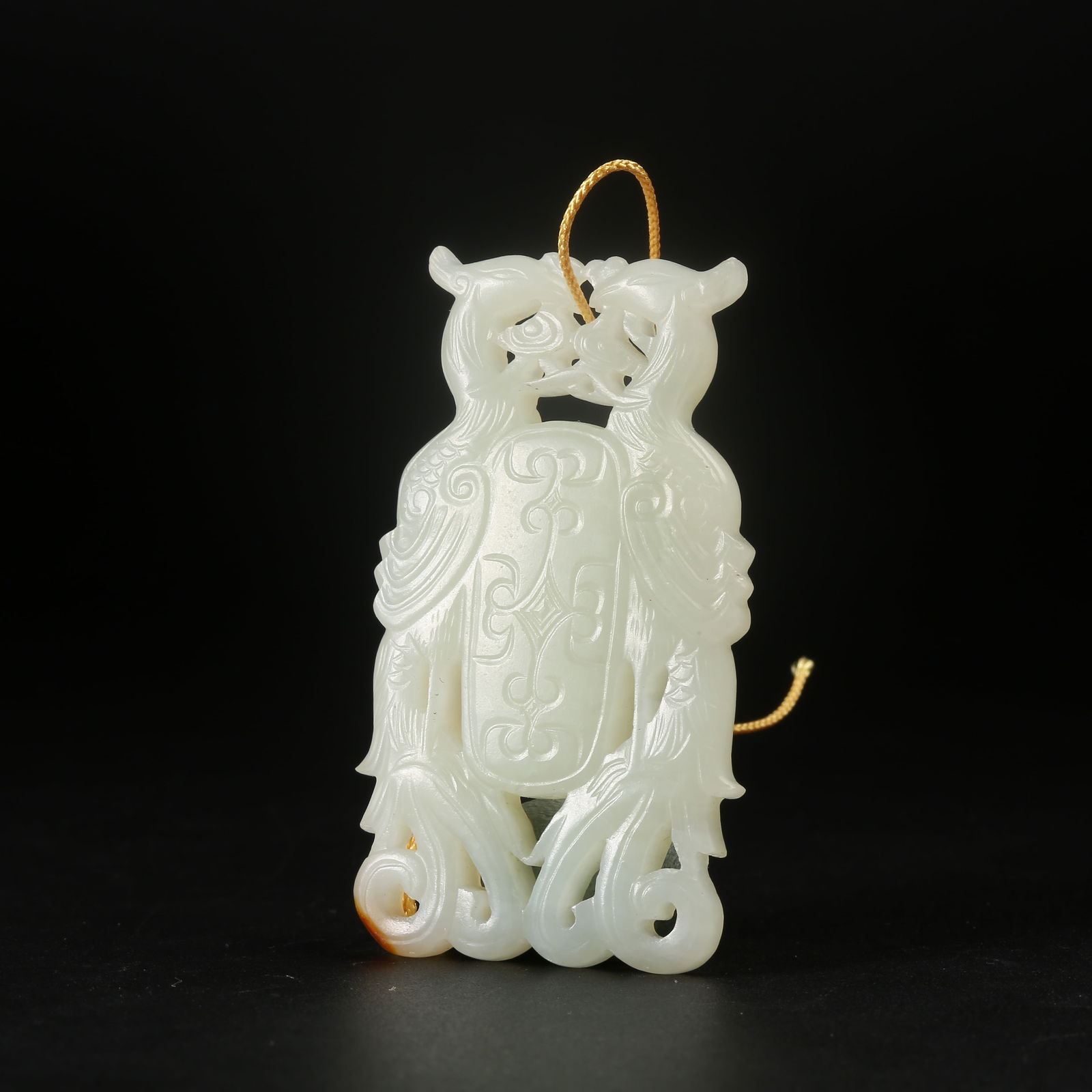 A ARCHAIC JADE DOUBLE-PHOENIX MOTIF PENDANT (1 of 7)