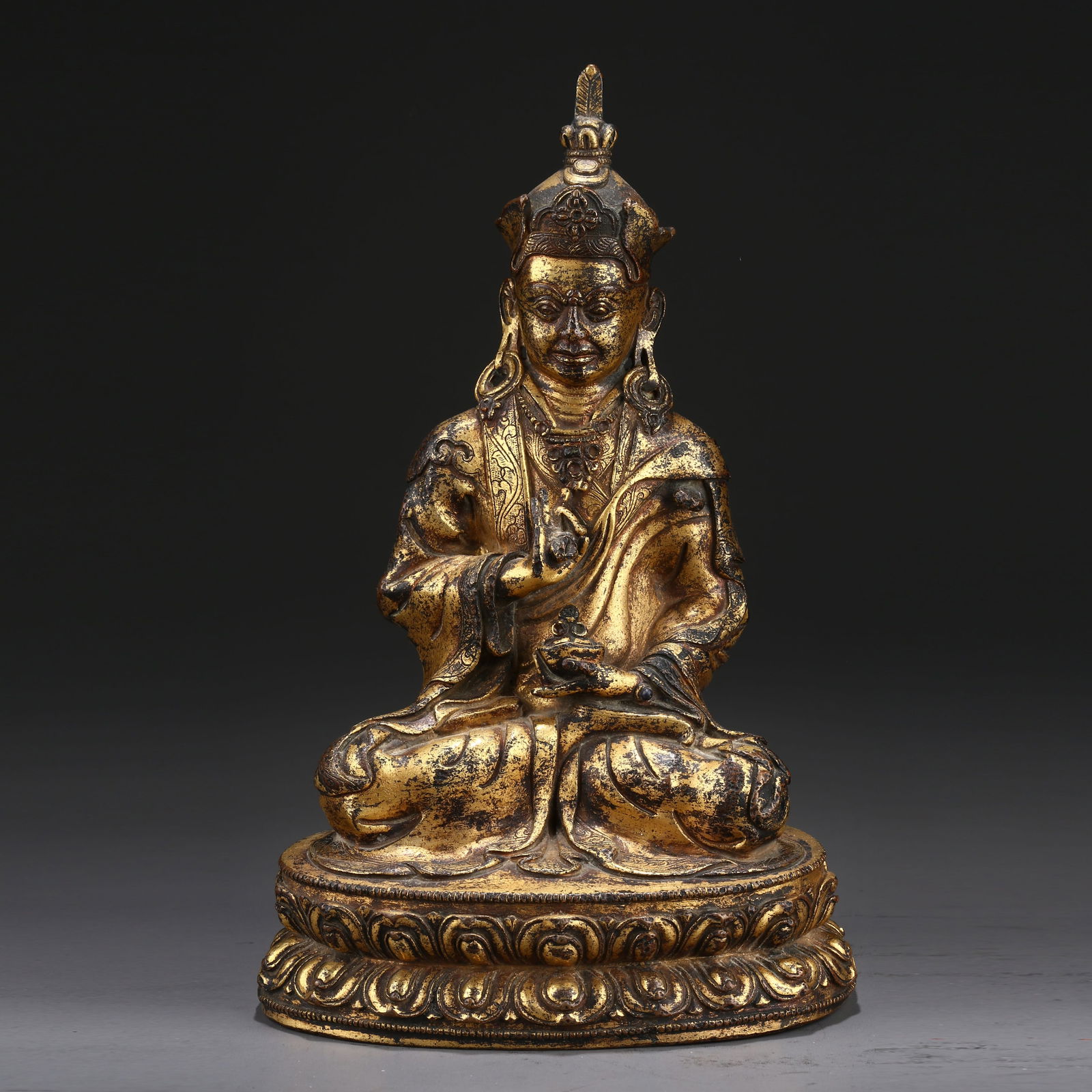 A GILT BRONZE STATUE OF PADMASAMBHAVA: Gilt Bronze Statue of Padmasambhava
