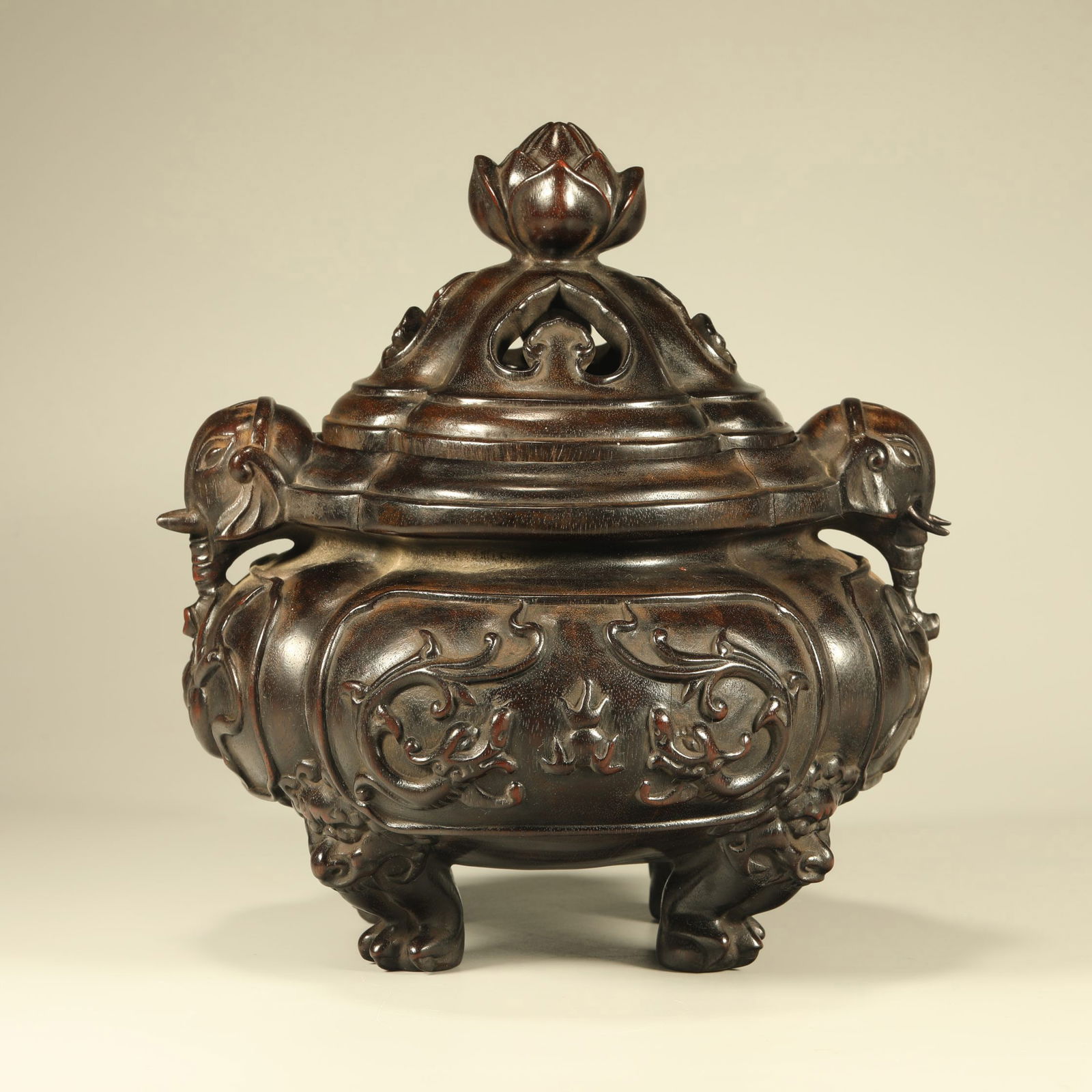 A ZITAN WOOD INCENSE BURNER CARVED WITH DRAGON MOTIFS AND ELEPHANT-HEAD HANDLES (1 of 6)
