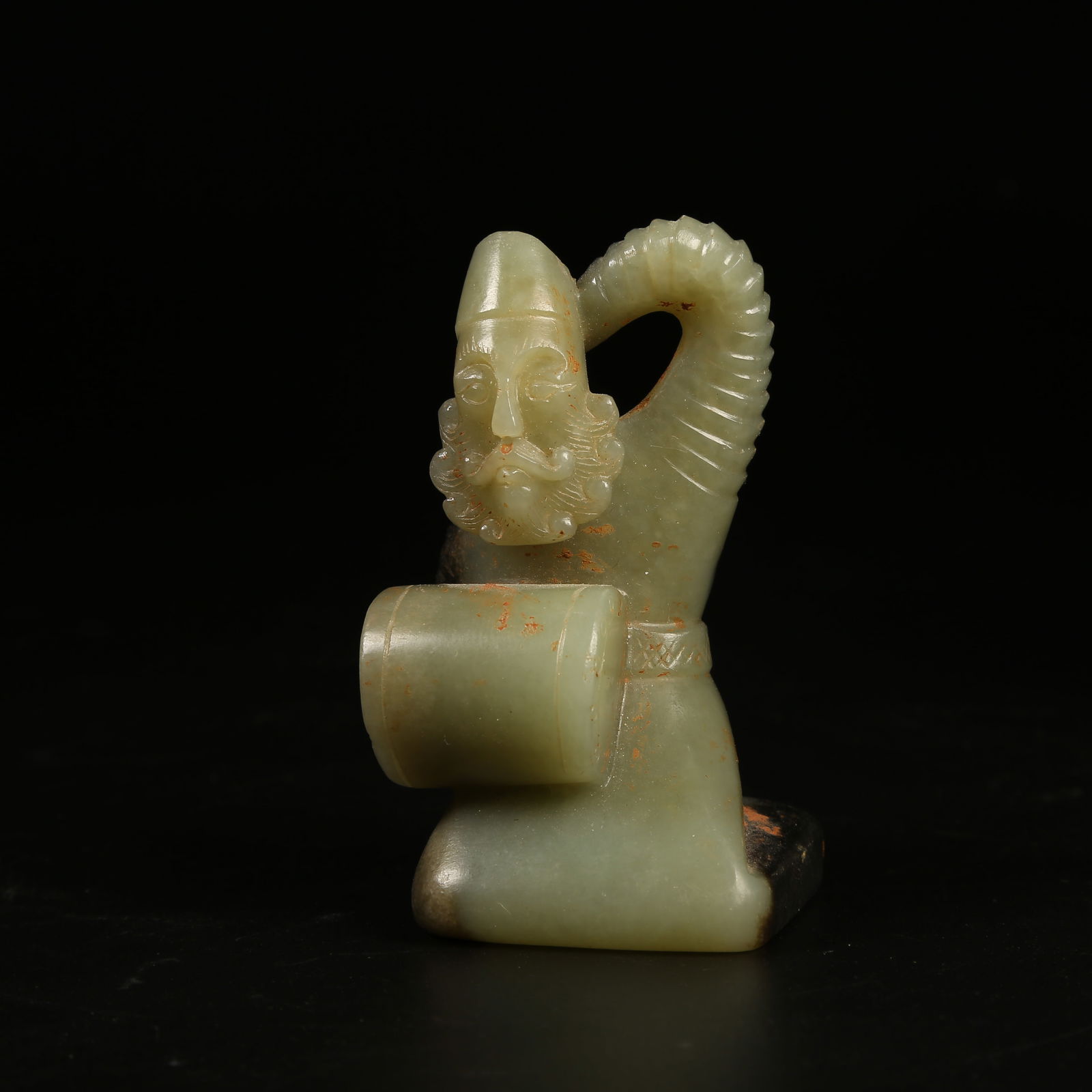 A ARCHAIC JADE HU PERSON DRUMMING ORNAMENT: Archaic Jade Hu Person Drumming Ornament
