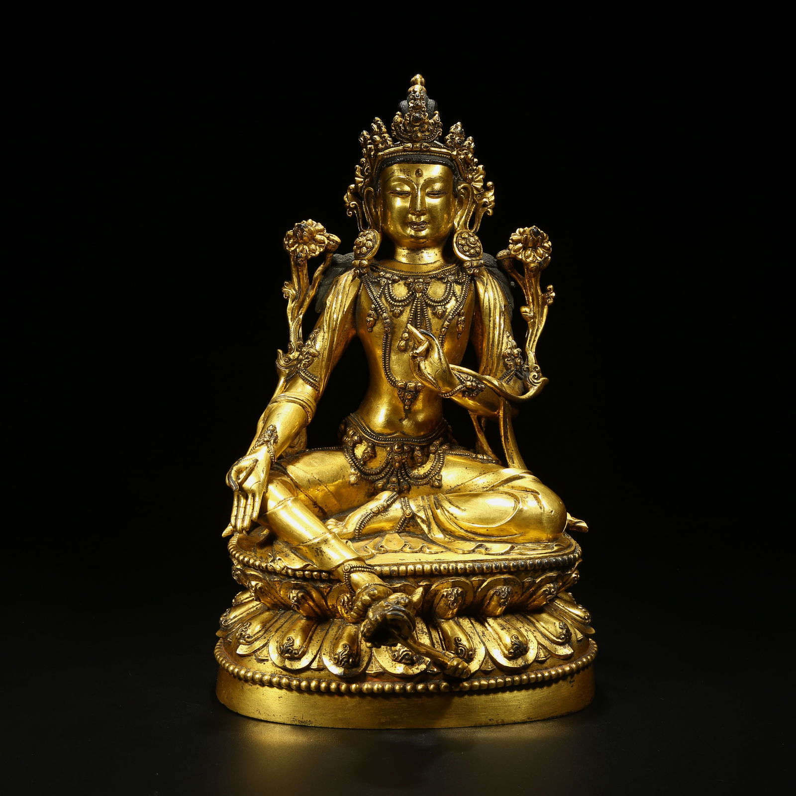 A GILT BRONZE STATUE OF GREEN TARA: Gilt Bronze Statue of Green Tara