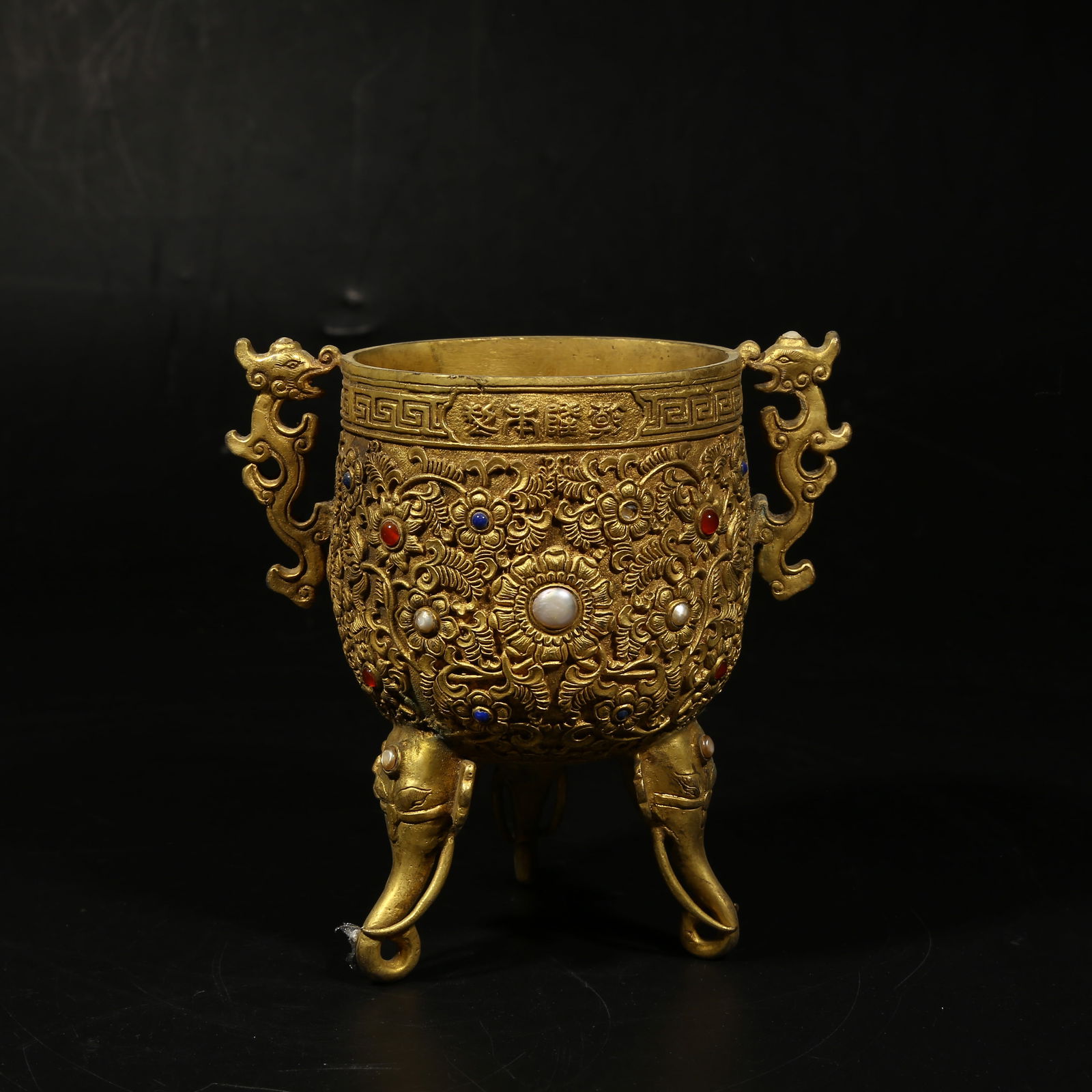 A GILDED BRONZE YONGGU CUP INLAID WITH GEMS (1 of 9)