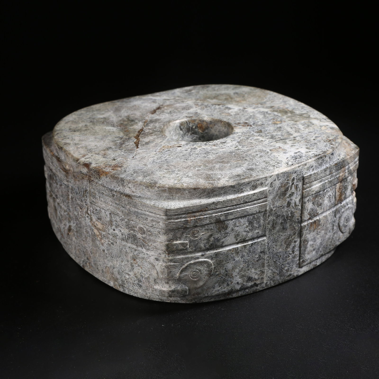 A ARCHAIC JADE CONG WITH DIVINE FACE MOTIF: Archaic jade cong with divine face motif