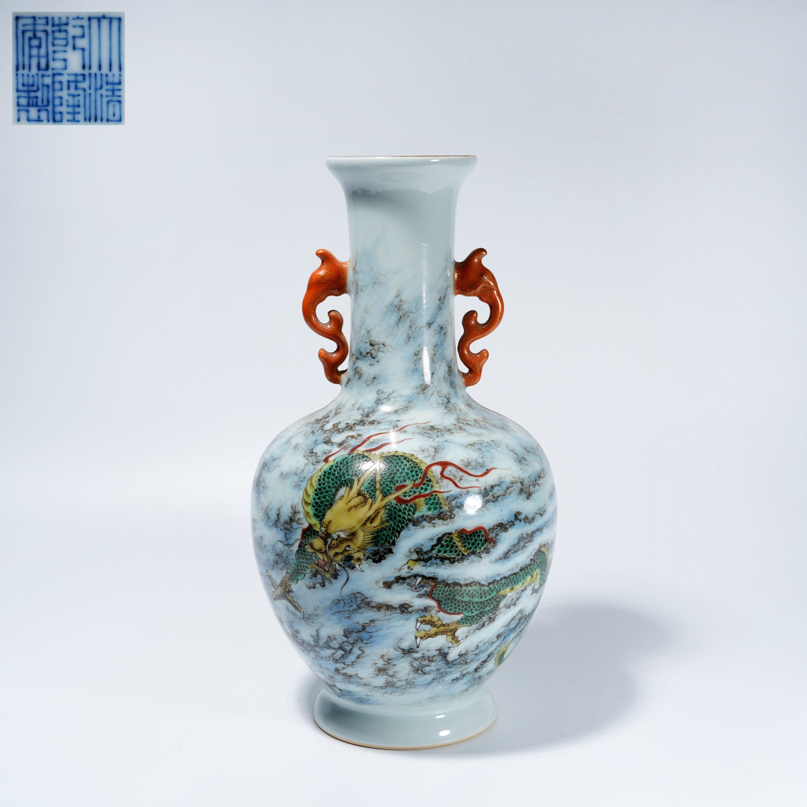 A FAMILLE-ROSE DOUBLE-HANDLED VASE WITH CLOUD-AND-DRAGON MOTIF: Famille-Rose Double-Handled Vase with Cloud-and-Dragon Motif