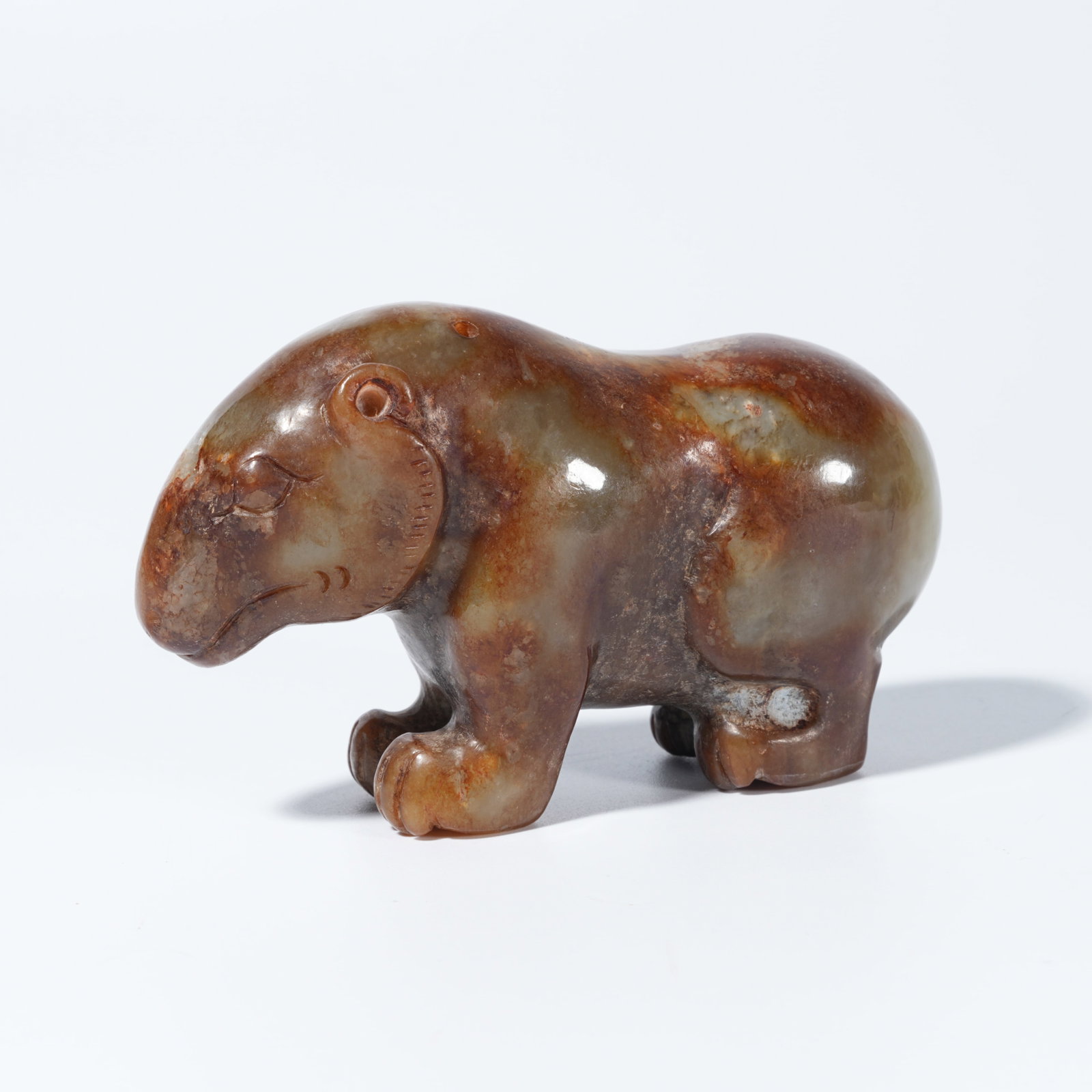 A ARCHAIC JADE CARVED BEAR FIGURE (1 of 10)